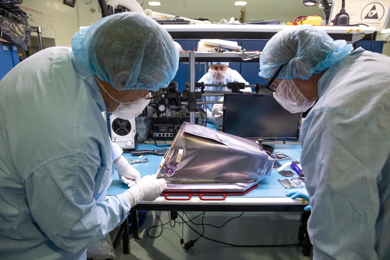 Engineers install multilayer insulation (MLI) on the Mass Spectrometer Observing Lunar Operations (MSolo) instrument inside Kennedy Space Center’s Space Station Processing Facility on Oct. 20, 2022. The activity is in preparation for the Polar Resources Ice Mining Experiment-1 (PRIME-1) mission, which will be the first in-situ resource utilization demonstration on the Moon. MLI protects the instrument from thermal temperature extremes, helping to insulate at cold temperatures and to cool at higher temperatures when solar lighting conditions or lunar infrared reflects onto the instrument. Researchers and engineers are preparing MSolo instruments to launch on four robotic missions as part of NASA’s Commercial Lunar Payload Services – commercial deliveries beginning in 2023 that will perform science experiments, test technologies, and demonstrate capabilities to help NASA explore the Moon and prepare for crewed missions to the lunar surface. 