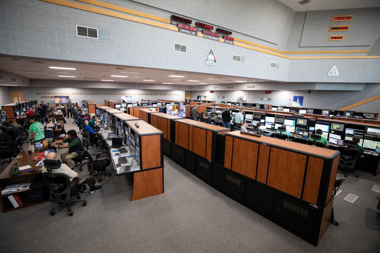 Artemis teams conduct a launch simulation for the Artemis I mission inside the Rocco A. Petrone Launch Control Center at NASA’s Kennedy Space Center in Florida on Oct. 27, 2022. Artemis I will be the first integrated test of NASA’s Space Launch System (SLS) rocket and Orion spacecraft. The primary goal of Artemis I is to thoroughly test the integrated systems before crewed missions by launching Orion atop the SLS rocket, operating the spacecraft in a deep space environment, testing Orion’s heat shield, and recovering the crew module after reentry, descent, and splashdown. During the flight, Orion will launch atop the most powerful rocket in the world and fly farther than any human-rated spacecraft has ever flown, paving the way for human deep space exploration and demonstrating our commitment and capability to extend human presence to the Moon and beyond. 