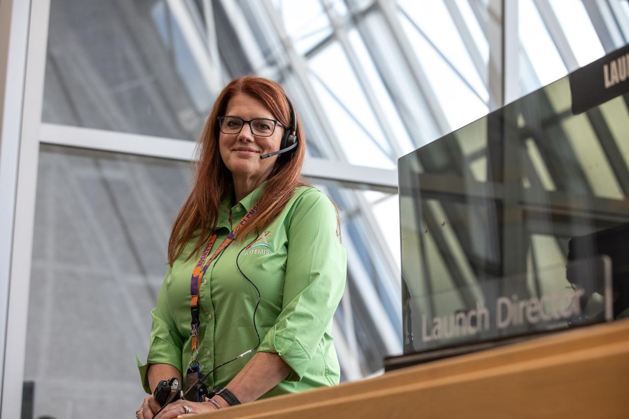 Artemis I Launch Director Charlie Blackwell-Thompson stands at her console in Firing Room 1 as Artemis teams conduct a launch simulation for the Artemis I mission inside the Rocco A. Petrone Launch Control Center at NASA’s Kennedy Space Center in Florida on Oct. 27, 2022. Artemis I will be the first integrated test of NASA’s Space Launch System (SLS) rocket and Orion spacecraft. The primary goal of Artemis I is to thoroughly test the integrated systems before crewed missions by launching Orion atop the SLS rocket, operating the spacecraft in a deep space environment, testing Orion’s heat shield, and recovering the crew module after reentry, descent, and splashdown. During the flight, Orion will launch atop the most powerful rocket in the world and fly farther than any human-rated spacecraft has ever flown, paving the way for human deep space exploration and demonstrating our commitment and capability to extend human presence to the Moon and beyond. 
