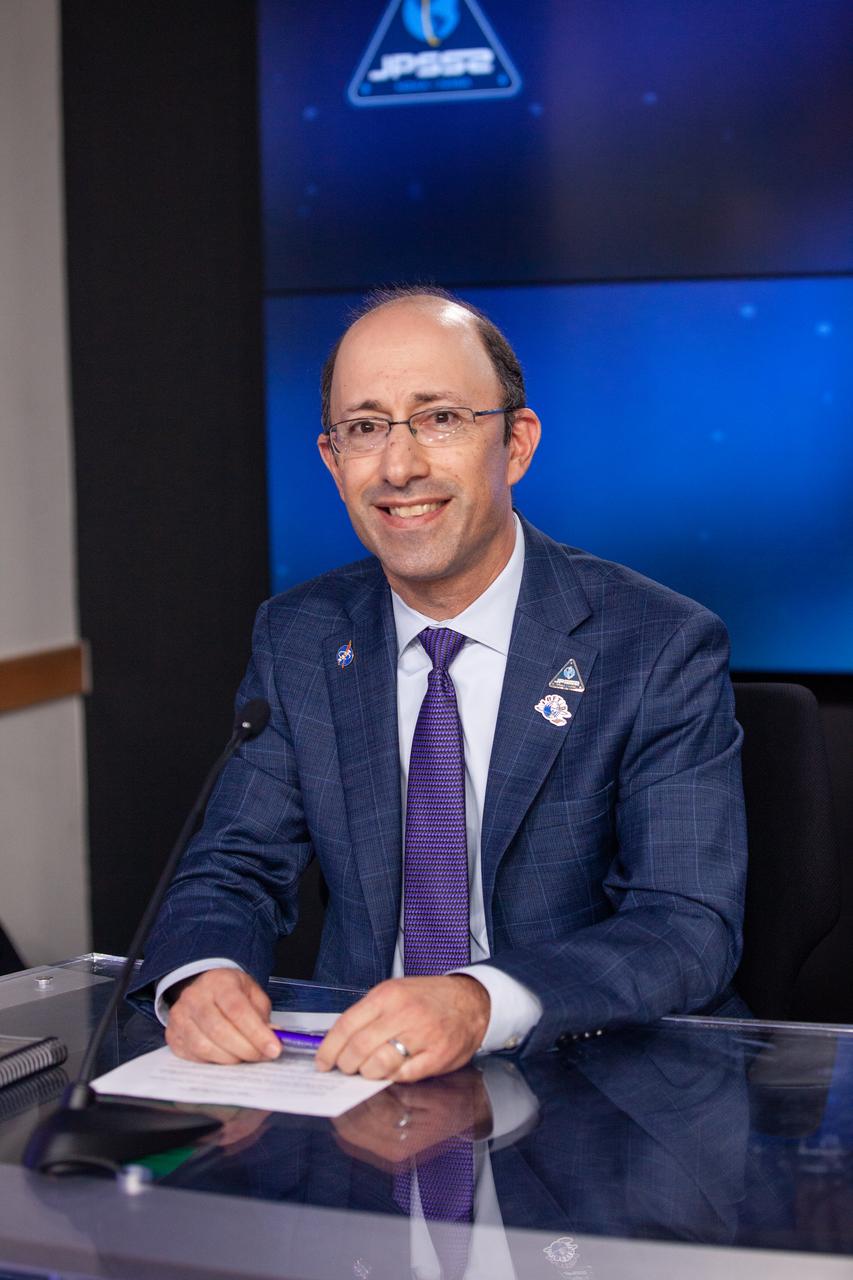 John Gagosian, director, NASA’s Joint Agency Satellite Division, participates in a prelaunch news conference for the National Oceanic and Atmospheric Administration’s (NOAA) Joint Polar Satellite System-2 (JPSS-2) and NASA Low-Earth Orbit Flight Test of an Inflatable Decelerator (LOFTID) technology demonstration at Vandenberg Space Force Base in California on Oct. 28, 2022. JPSS-2 is the third satellite in the polar satellite series and is expected to capture data to improve weather forecasts, helping scientists predict and prepare for extreme weather events and climate change. JPSS-2 is scheduled to launch at 2:25 a.m. PDT Tuesday, Nov. 1, on a United Launch Alliance (ULA) Atlas V 401 rocket from Space Launch Complex 3 at Vandenberg Space Force Base in California. Launching with JPSS-2 is NASA’s LOFTID technology demonstration. After JPSS-2 safely reaches orbit, LOFTID will follow a re-entry trajectory from low-Earth orbit to demonstrate the inflatable heat shield’s ability to slow down and survive re-entry. LOFTID is a partnership with ULA and is dedicated to the memory of Bernard Kutter, one of the company’s engineers who played a key role in developing the technology. LOFTID will demonstrate how the inflatable aeroshell, or heat shield, can slow down and survive re-entry in conditions relevant to many potential applications, whether landing humans on Mars, new missions to Venus and Titan, or returning heavier payloads and samples from low-Earth orbit.