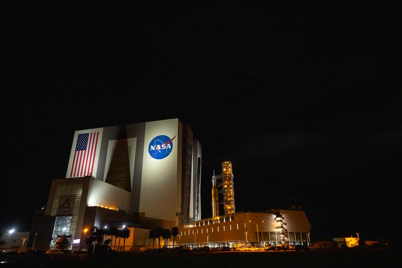 The mobile launcher, with NASA’s Space Launch System (SLS) rocket and Orion spacecraft atop, rolls out of the Vehicle Assembly Building’s High Bay 3 to begin its 4.2-mile journey to Launch Pad 39B at NASA’s Kennedy Space Center in Florida on Nov. 4, 2022. Artemis I will be the first integrated test of NASA’s SLS rocket and Orion spacecraft and is scheduled to launch Monday, Nov. 14. The primary goal of Artemis I is to thoroughly test the integrated systems before crewed missions by launching Orion atop the SLS rocket, operating the spacecraft in a deep space environment, testing Orion’s heat shield, and recovering the crew module after reentry, descent, and splashdown. During the flight, Orion will launch atop the most powerful rocket in the world and fly farther than any human-rated spacecraft has ever flown, paving the way for human deep space exploration and demonstrating our commitment and capability to extend human presence to the Moon and beyond.