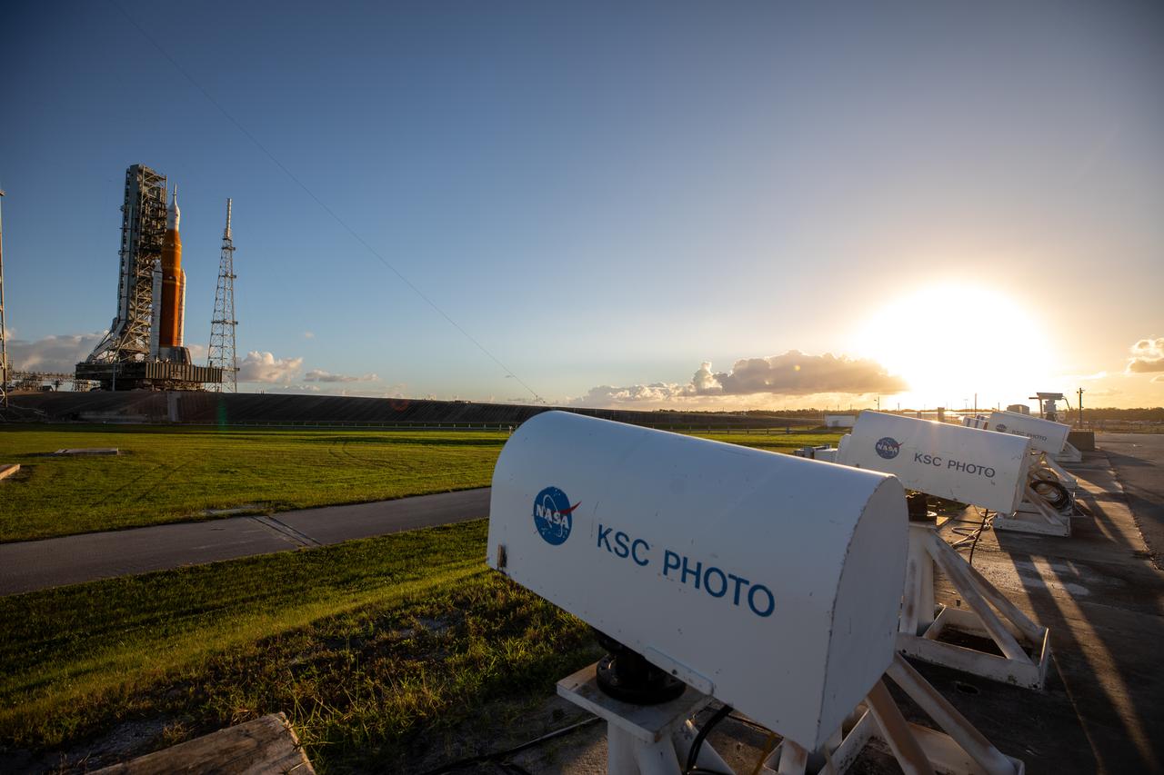 NASA’s Space Launch System (SLS) rocket and Orion spacecraft, standing atop the mobile launcher, arrive at Launch Pad 39B at the agency’s Kennedy Space Center in Florida on Nov. 4, 2022, ahead of the uncrewed Artemis I launch. Artemis I will be the first integrated test of NASA’s SLS rocket and Orion spacecraft and is scheduled to launch Monday, Nov. 14. The primary goal of Artemis I is to thoroughly test the integrated systems before crewed missions by launching Orion atop the SLS rocket, operating the spacecraft in a deep space environment, testing Orion’s heat shield, and recovering the crew module after reentry, descent, and splashdown. During the flight, Orion will launch atop the most powerful rocket in the world and fly farther than any human-rated spacecraft has ever flown, paving the way for human deep space exploration and demonstrating our commitment and capability to extend human presence to the Moon and beyond.