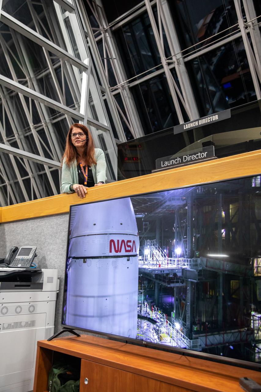 Artemis I Launch Director Charlie Blackwell-Thompson stands at her console in Firing Room 1 inside the Rocco A. Petrone Launch Control Center at NASA’s Kennedy Space Center in Florida on Nov. 4, 2022, as NASA’s Space Launch System (SLS) rocket and Orion spacecraft for the Artemis I mission roll out to Launch Pad 39B. The primary goal of Artemis I is to thoroughly test the integrated systems before crewed missions by launching Orion atop the SLS rocket, operating the spacecraft in a deep space environment, testing Orion’s heat shield, and recovering the crew module after reentry, descent, and splashdown. During the flight, Orion will launch atop the most powerful rocket in the world and fly farther than any human-rated spacecraft has ever flown, paving the way for human deep space exploration and demonstrating our commitment and capability to extend human presence to the Moon and beyond.