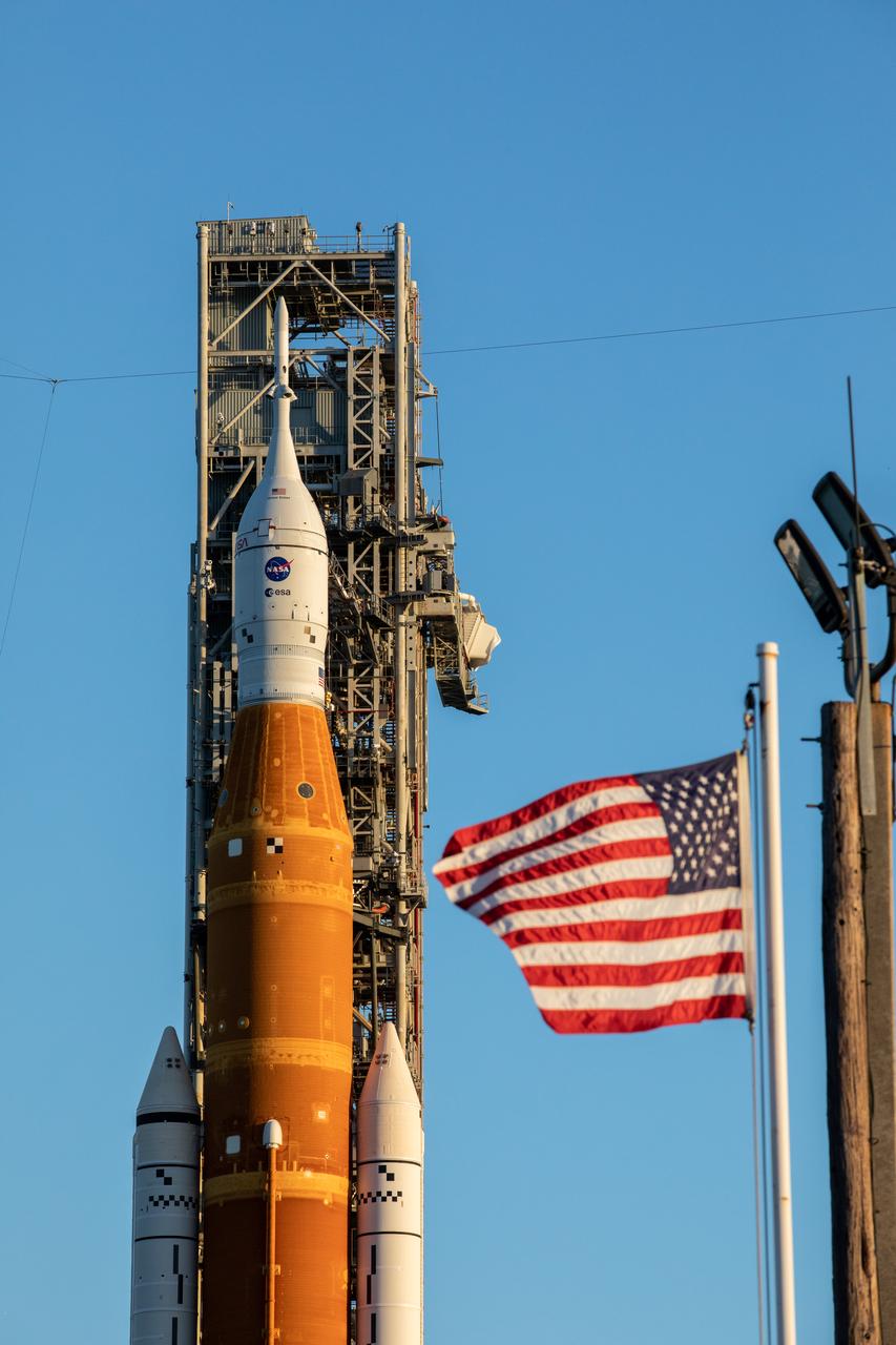 Standing atop the mobile launcher, NASA’s Space Launch System (SLS) rocket and Orion spacecraft arrive at Launch Pad 39B at the agency’s Kennedy Space Center in Florida on Nov. 4, 2022. The Artemis I stack was carried from the Vehicle Assembly Building to the pad – a 4.2-mile journey that took nearly 11 hours to complete – by NASA’s crawler-transporter 2 ahead of the uncrewed launch. Artemis I will be the first integrated test of NASA’s SLS rocket and Orion spacecraft and is scheduled to launch Monday, Nov. 14. The primary goal of Artemis I is to thoroughly test the integrated systems before crewed missions by launching Orion atop the SLS rocket, operating the spacecraft in a deep space environment, testing Orion’s heat shield, and recovering the crew module after reentry, descent, and splashdown. During the flight, Orion will launch atop the most powerful rocket in the world and fly farther than any human-rated spacecraft has ever flown, paving the way for human deep space exploration and demonstrating our commitment and capability to extend human presence to the Moon and beyond.