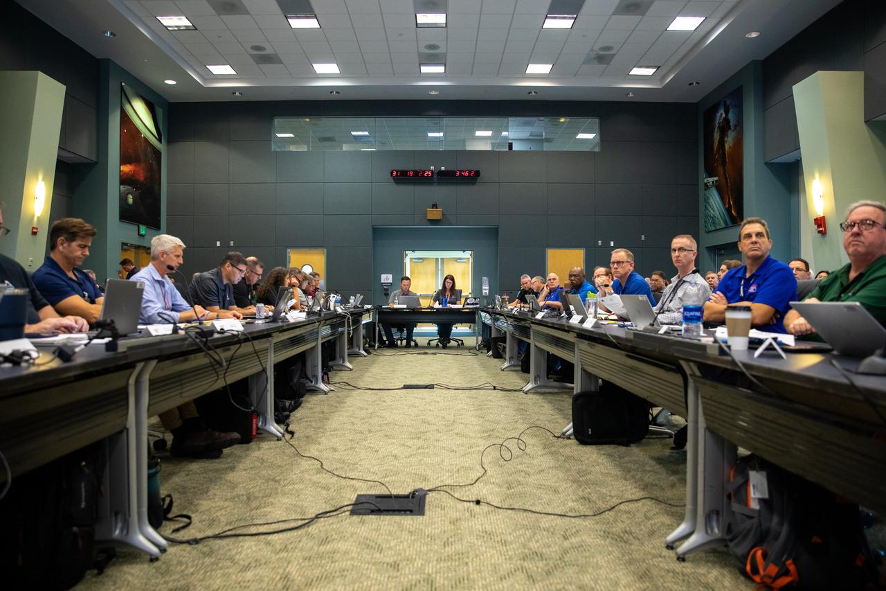 Artemis I team members conduct the Artemis I launch pre-test briefing on Nov. 12, 2022, at NASA’s Kennedy Space Center in Florida. The first in a series of increasingly complex missions, Artemis I will provide a foundation for human deep space exploration and demonstrate our commitment and capability to extend human presence to the Moon and beyond. The primary goal of Artemis I is to thoroughly test the integrated systems before crewed missions by operating the spacecraft in a deep space environment, testing Orion’s heat shield, and recovering the crew module after reentry, descent, and splashdown.