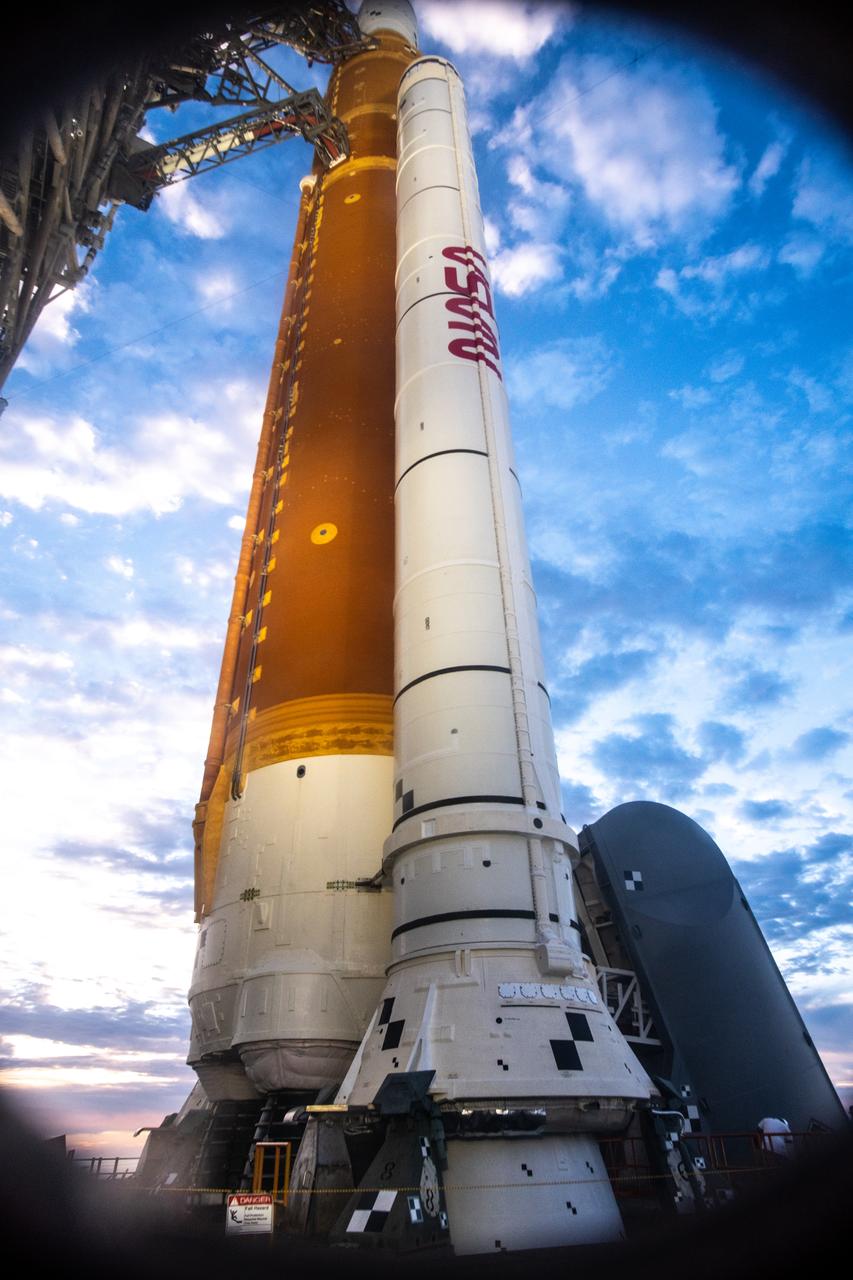 NASA’s Artemis I Space Launch System and Orion spacecraft atop the mobile launcher are in view on the pad at Launch Complex 39B at NASA’s Kennedy Space Center in Florida on Nov. 15, 2022. Liftoff was at 1:47 a.m. EST on Nov. 16. The first in a series of increasingly complex missions, Artemis I will provide a foundation for human deep space exploration and demonstrate our commitment and capability to extend human presence to the Moon and beyond. The primary goal of Artemis I is to thoroughly test the integrated systems before crewed missions by operating the spacecraft in a deep space environment, testing Orion’s heat shield, and recovering the crew module after reentry, descent, and splashdown. 