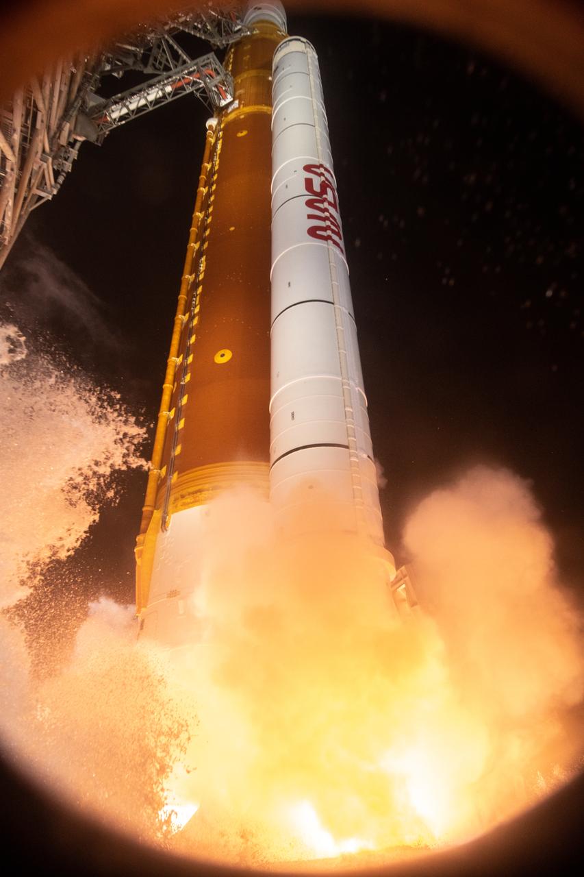 Liftoff! NASA’s Space Launch System carrying the Orion spacecraft lifts off the pad at Launch Complex 39B at the agency’s Kennedy Space Center in Florida at 1:47 a.m. EST on Nov. 16, 2022. The first in a series of increasingly complex missions, Artemis I will provide a foundation for human deep space exploration and demonstrate our commitment and capability to extend human presence to the Moon and beyond. The primary goal of Artemis I is to thoroughly test the integrated systems before crewed missions by operating the spacecraft in a deep space environment, testing Orion’s heat shield, and recovering the crew module after reentry, descent, and splashdown.