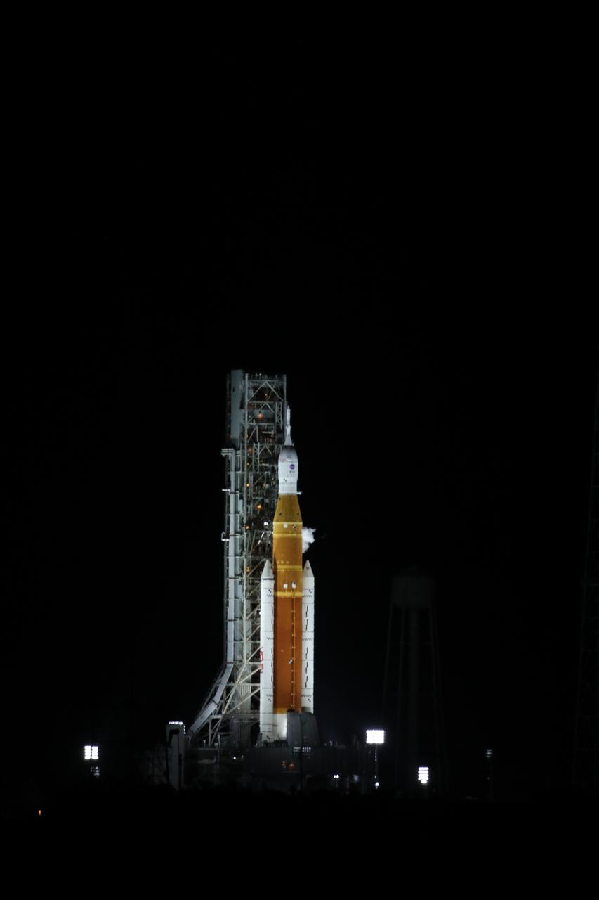 NASA’s Space Launch System and Orion spacecraft atop the mobile launcher await ignition and liftoff on Artemis I from the pad at Launch Complex 39B at NASA’s Kennedy Space Center in Florida on Nov. 16, 2022. Liftoff was at 1:47 a.m. EST. The first in a series of increasingly complex missions, Artemis I will provide a foundation for human deep space exploration and demonstrate our commitment and capability to extend human presence to the Moon and beyond. The primary goal of Artemis I is to thoroughly test the integrated systems before crewed missions by operating the spacecraft in a deep space environment, testing Orion’s heat shield, and recovering the crew module after reentry, descent, and splashdown.