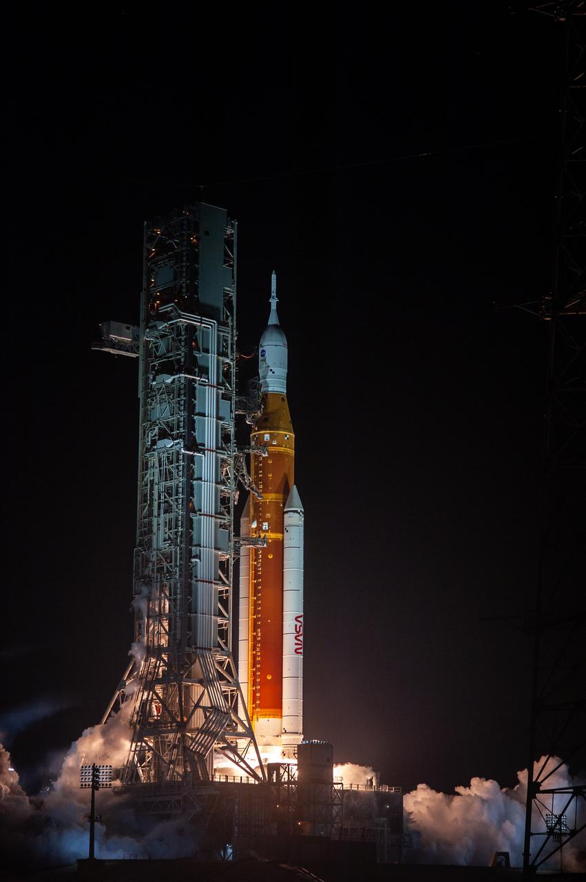 Liftoff! NASA’s Space Launch System carrying the Orion spacecraft lifts off the pad at Launch Complex 39B at the agency’s Kennedy Space Center in Florida at 1:47 a.m. EST on Nov. 16, 2022. The first in a series of increasingly complex missions, Artemis I will provide a foundation for human deep space exploration and demonstrate our commitment and capability to extend human presence to the Moon and beyond. The primary goal of Artemis I is to thoroughly test the integrated systems before crewed missions by operating the spacecraft in a deep space environment, testing Orion’s heat shield, and recovering the crew module after reentry, descent, and splashdown. 
