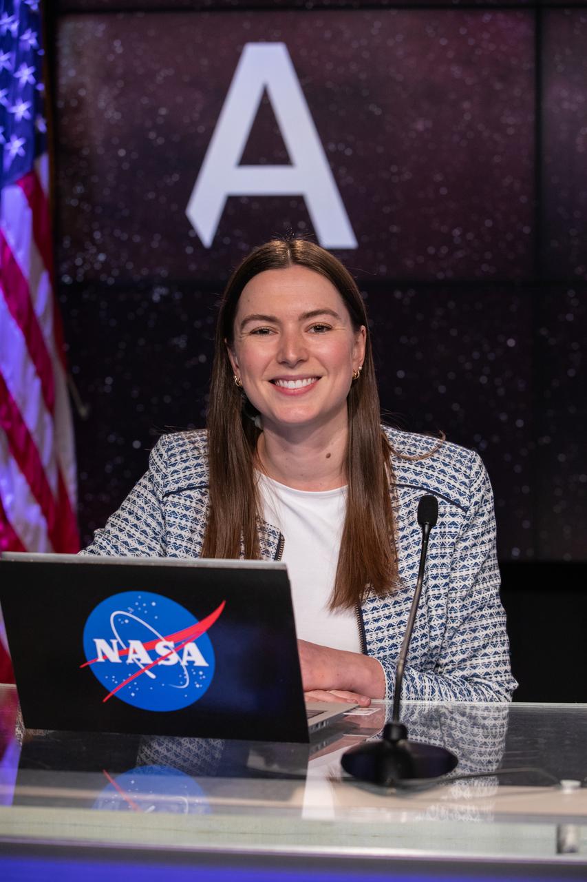 Jackie McGuiness, NASA Communications, moderates a postlaunch news conference on Nov. 16, 2022, at NASA’s Kennedy Space Center in Florida, after launch of Artemis I at 1:47 a.m. EST from Kennedy’s Launch Complex 39B. The first in a series of increasingly complex missions, Artemis I will provide a foundation for human deep space exploration and demonstrate our commitment and capability to extend human presence to the Moon and beyond. The primary goal of Artemis I is to thoroughly test the integrated systems before crewed missions by operating the spacecraft in a deep space environment, testing Orion’s heat shield, and recovering the crew module after reentry, descent, and splashdown.