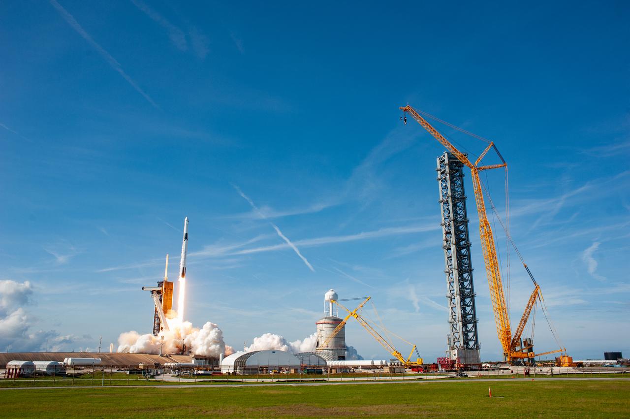 The SpaceX Falcon 9 rocket carrying the Dragon cargo spacecraft lifts off from Launch Complex 39A at NASA’s Kennedy Space Center in Florida on Nov. 26, 2022, on the company’s 26th commercial resupply services mission for the agency to the International Space Station. Liftoff was at 2:20 p.m. EST. Dragon will deliver more than 7,700 pounds of cargo, including a variety of NASA investigations, supplies, and equipment to the crew aboard the space station, including the next pair of ISS Roll Out Solar Arrays (iROSAs). The spacecraft is expected to spend about a month attached to the orbiting outpost before it returns to Earth with research and return cargo, splashing down off the coast of Florida.