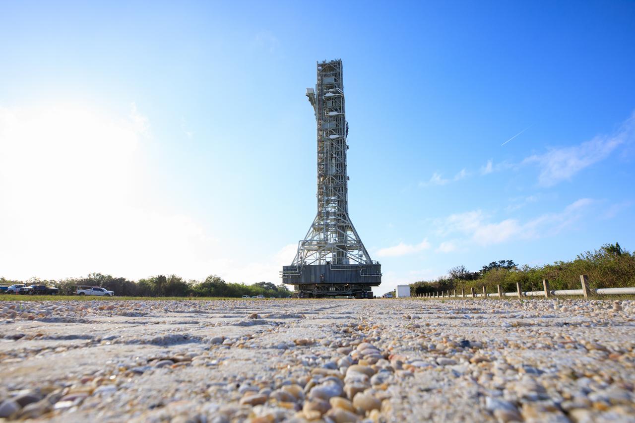 NASA’s mobile launcher, carried atop the crawler-transporter 2, left launch pad 39B at NASA’s Kennedy Space Center in Florida on Dec. 8, 2022, following the successful launch of the agency’s Space Launch System (SLS) rocket and Orion spacecraft on the Artemis I flight test on Nov. 16, 2022. The mobile launcher is scheduled to return to the Vehicle Assembly Building (VAB) on Dec. 9, 2022, and it will remain inside the VAB for several weeks as teams get it ready for the Artemis II crewed mission. Following its stay in the VAB, it will go to the mobile launcher park site location at Kennedy where it will undergo emergency egress modifications and testing to support future Artemis missions. 