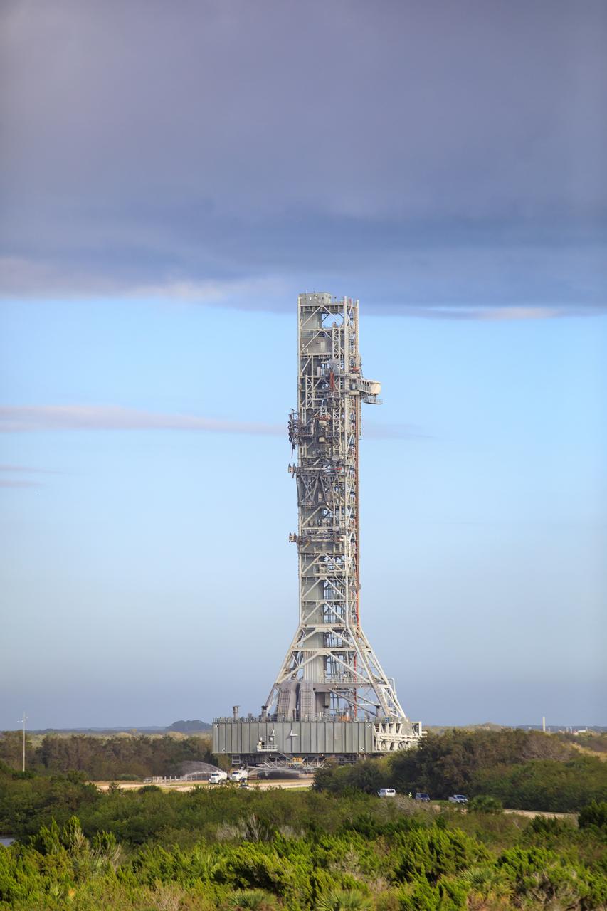 NASA’s mobile launcher, carried atop the crawler-transporter 2, left launch pad 39B at NASA’s Kennedy Space Center in Florida on Dec. 8, 2022, following the successful launch of the agency’s Space Launch System (SLS) rocket and Orion spacecraft on the Artemis I flight test on Nov. 16, 2022. The mobile launcher is scheduled to return to the Vehicle Assembly Building (VAB) on Dec. 9, 2022, and it will remain inside the VAB for several weeks as teams get it ready for the Artemis II crewed mission. Following its stay in the VAB, it will go to the mobile launcher park site location at Kennedy where it will undergo emergency egress modifications and testing to support future Artemis missions. 