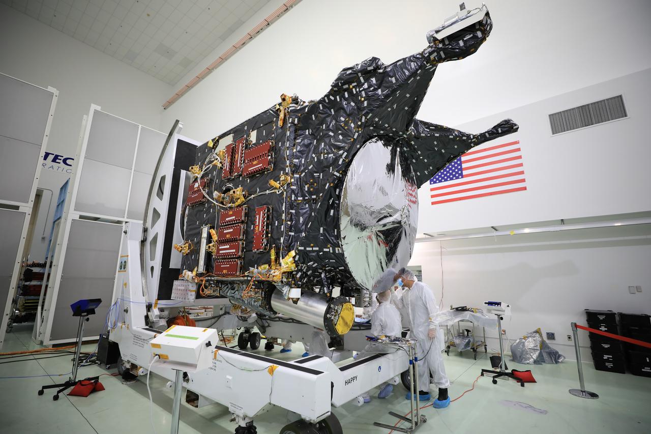 A team prepares NASA’s Psyche spacecraft for launch inside the Astrotech Space Operations Facility near the agency’s Kennedy Space Center in Florida on Dec. 8, 2022. Psyche will launch atop a SpaceX Falcon Heavy rocket from Launch Complex 39A at Kennedy. Launch is targeted for no earlier than Oct. 10, 2023. The spacecraft will use solar-electric propulsion to travel approximately 1.5 billion miles to rendezvous with its namesake asteroid in 2026. The Psyche mission is led by Arizona State University. NASA’s Jet Propulsion Laboratory, which is managed for the agency by Caltech in Pasadena, California, is responsible for the mission’s overall management, system engineering, integration and testing, and mission operations. Maxar Technologies in Palo Alto, California, provided the high-power solar electric propulsion spacecraft chassis. NASA’s Launch Services Program (LSP), based at Kennedy, is managing the launch. 