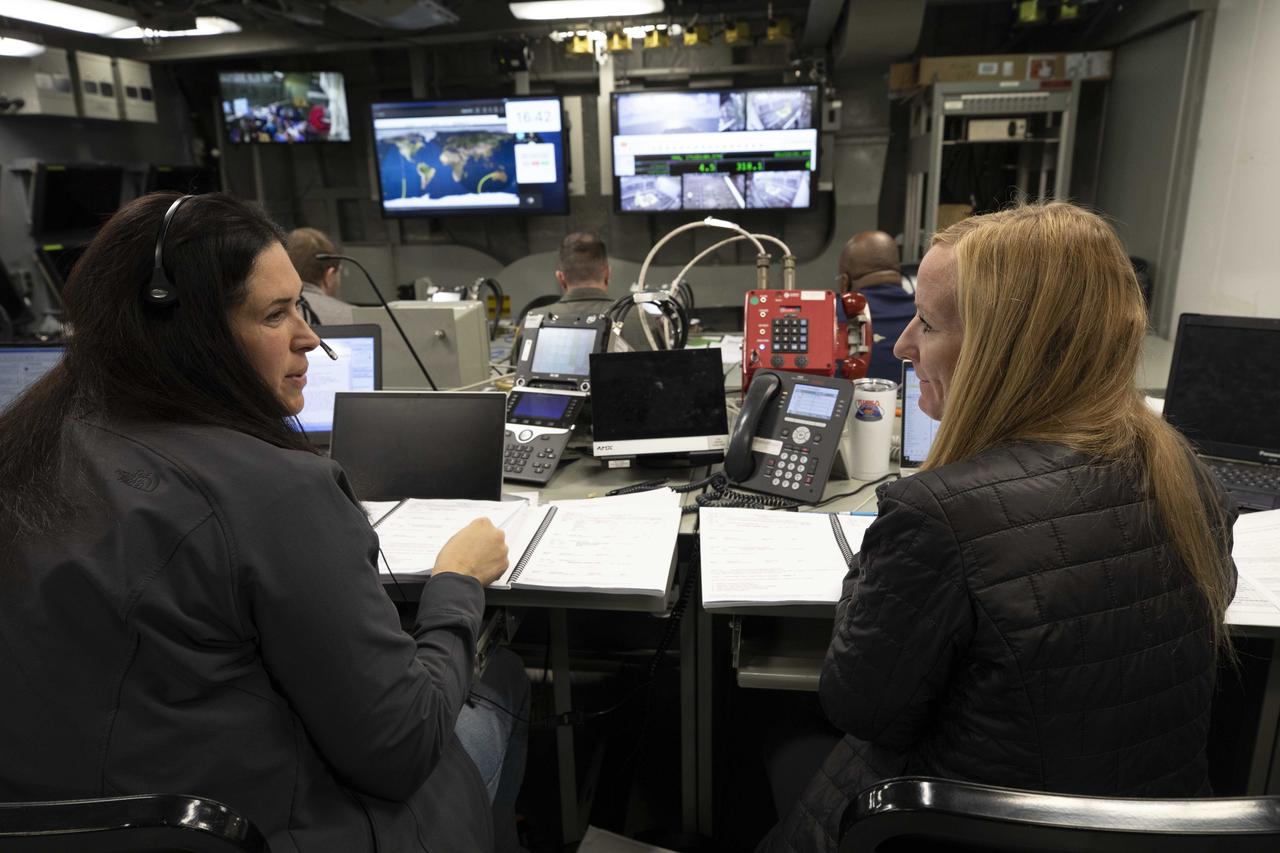 Inside a control room aboard USS Portland, members and leaders of NASA’s Landing and Recovery team run through preparations and procedures ahead of the Orion Spacecraft’s return from the Moon on Dec. 11 as part of the Artemis I mission.