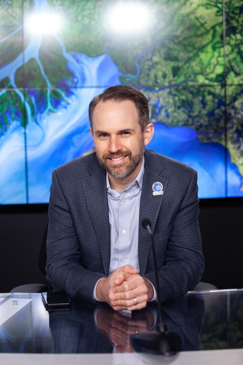 Tamlin Pavelsky, SWOT hydrology science lead, University of North Carolina, participates in a science briefing held by NASA and the French space agency Centre National d’Études Spatiales (CNES) for the Surface Water and Ocean Topography (SWOT) mission on Dec. 13, 2022, at Vandenberg Space Force Base in California. SWOT is scheduled to launch on a SpaceX Falcon 9 rocket from Space Launch Complex-4 East at Vandenberg on Dec. 15, 2022, at 3:46 a.m. PST. SWOT will be NASA’s first global survey of nearly all water on Earth’s surface. Scientists plan to use its observations to better understand the global water cycle, furnish insight into the ocean’s role in how climate change unfolds, and provide a global inventory of water resources. The SWOT mission is a collaborative effort between NASA and CNES with contributions from the Canadian Space Agency and the UK Space Agency. NASA’s Launch Services Program, based at the agency’s Kennedy Space Center in Florida, is managing the launch service.