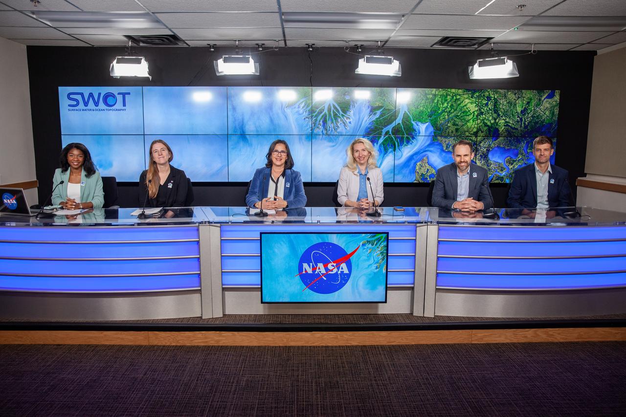 NASA and the French space agency Centre National d’Études Spatiales (CNES) hold a science briefing on the Surface Water and Ocean Topography (SWOT) mission on Dec. 13, 2022, at Vandenberg Space Force Base in California. Participating from left are Katherine Calvin, chief scientist and senior climate advisor, NASA; Selma Cherchali, Earth observation program head, CNES; Nadya Vinogradova Shiffer, SWOT program scientist, NASA; Tamlin Pavelsky, SWOT hydrology science lead, University of North Carolina; Benjamin Hamlington, research scientist, Sea Level and Ice Group, Jet Propulsion Laboratory. SWOT is scheduled to launch on a SpaceX Falcon 9 rocket from Space Launch Complex-4 East at Vandenberg on Dec. 15, 2022, at 3:46 a.m. PST. SWOT will be NASA’s first global survey of nearly all water on Earth’s surface. Scientists plan to use its observations to better understand the global water cycle, furnish insight into the ocean’s role in how climate change unfolds, and provide a global inventory of water resources. The SWOT mission is a collaborative effort between NASA and CNES with contributions from the Canadian Space Agency and the UK Space Agency. NASA’s Launch Services Program, based at the agency’s Kennedy Space Center in Florida, is managing the launch service.