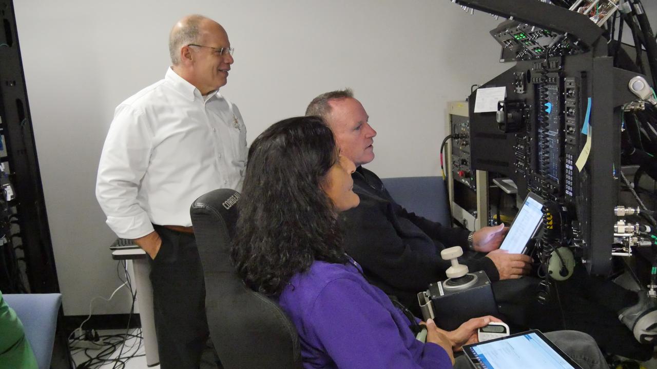 From left, Starliner Flight Crew Integration Manager Tony Ceccacci, and NASA astronauts Barry “Butch” Wilmore and Sunita “Suni” Williams participate in a mission rehearsal at Boeing’s Avionics and Software Integration Lab in Houston.
