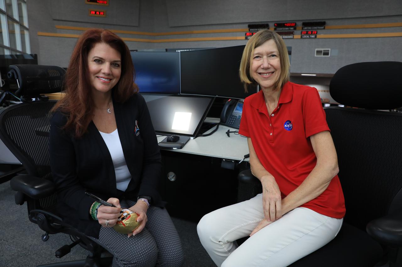 Artemis launch director, Charlie Blackwell-Thompson and associate administrator of NASA’s Space Operations Mission Directorate, Kathryn Lueders finish coloring in the other eye of the Japanese Daruma doll to highlight the successful Artemis I mission on Dec. 20, 2022 in Firing Room 1 of the Rocco A. Petrone Launch Control Center at NASA’s Kennedy Space Center in Florida. The Japan Aerospace Exploration Agency gave a Daruma doll to both Lueders and associate administrator for the Exploration Systems Development Mission Directorate, Jim Free as a token of good luck prior to the Artemis I launch. Free filled in his eye on Dec. 11, 2022, with Artemis I Ascent and Entry Flight Director Judd Frieling in Mission Control Center at NASA’s Johnson Space Center in Houston, Texas.
