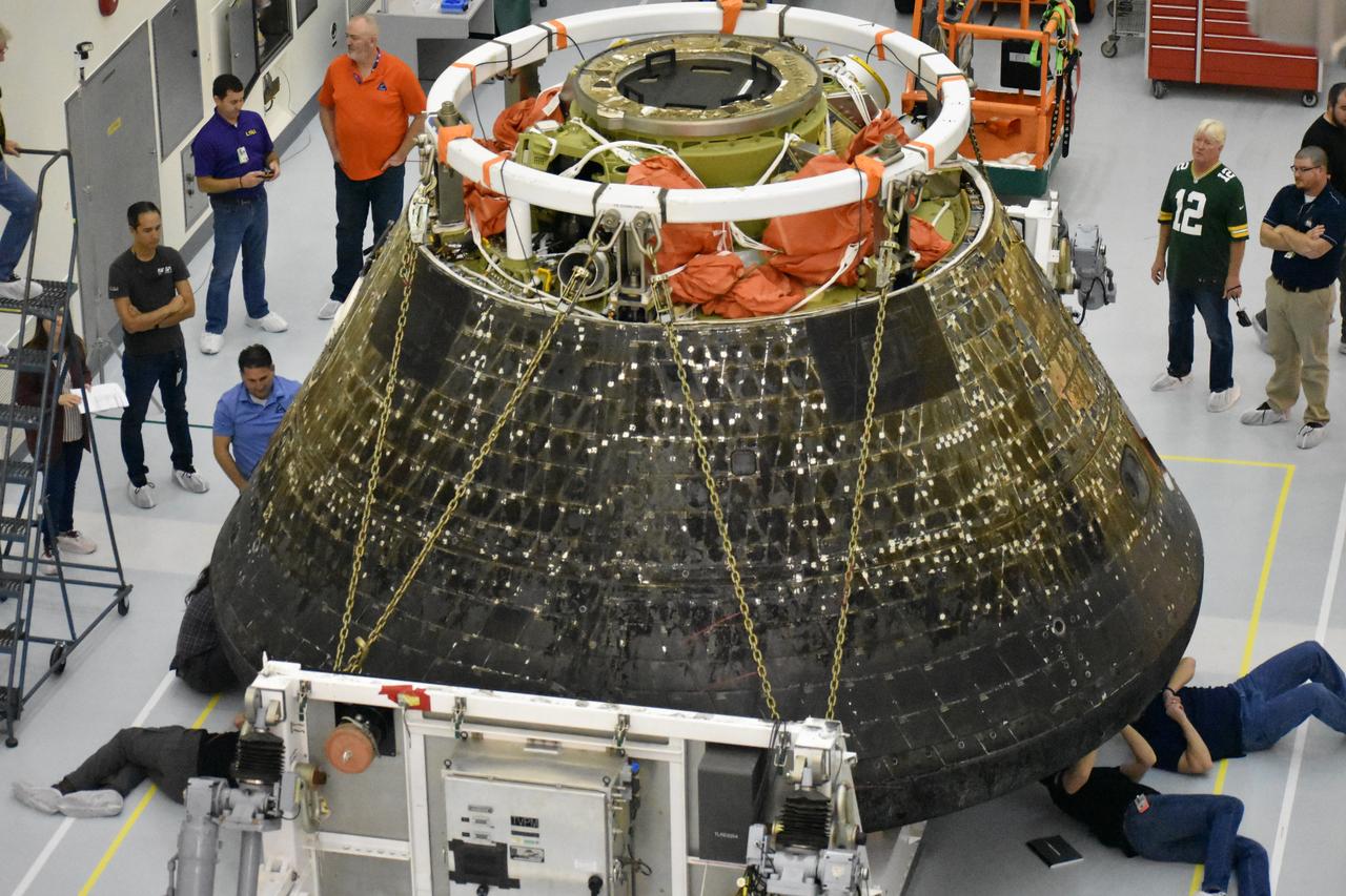 Inside the Multi Payload Processing Facility at NASA’s Kennedy Space Center in Florida, engineers and technicians conduct inspections of the heat shield on the Orion spacecraft for the Artemis I mission. Orion returned to Kennedy on Dec. 30, 2022, after splashing down in the Pacific Ocean on Dec. 11 following a 25-day mission around the Moon. 