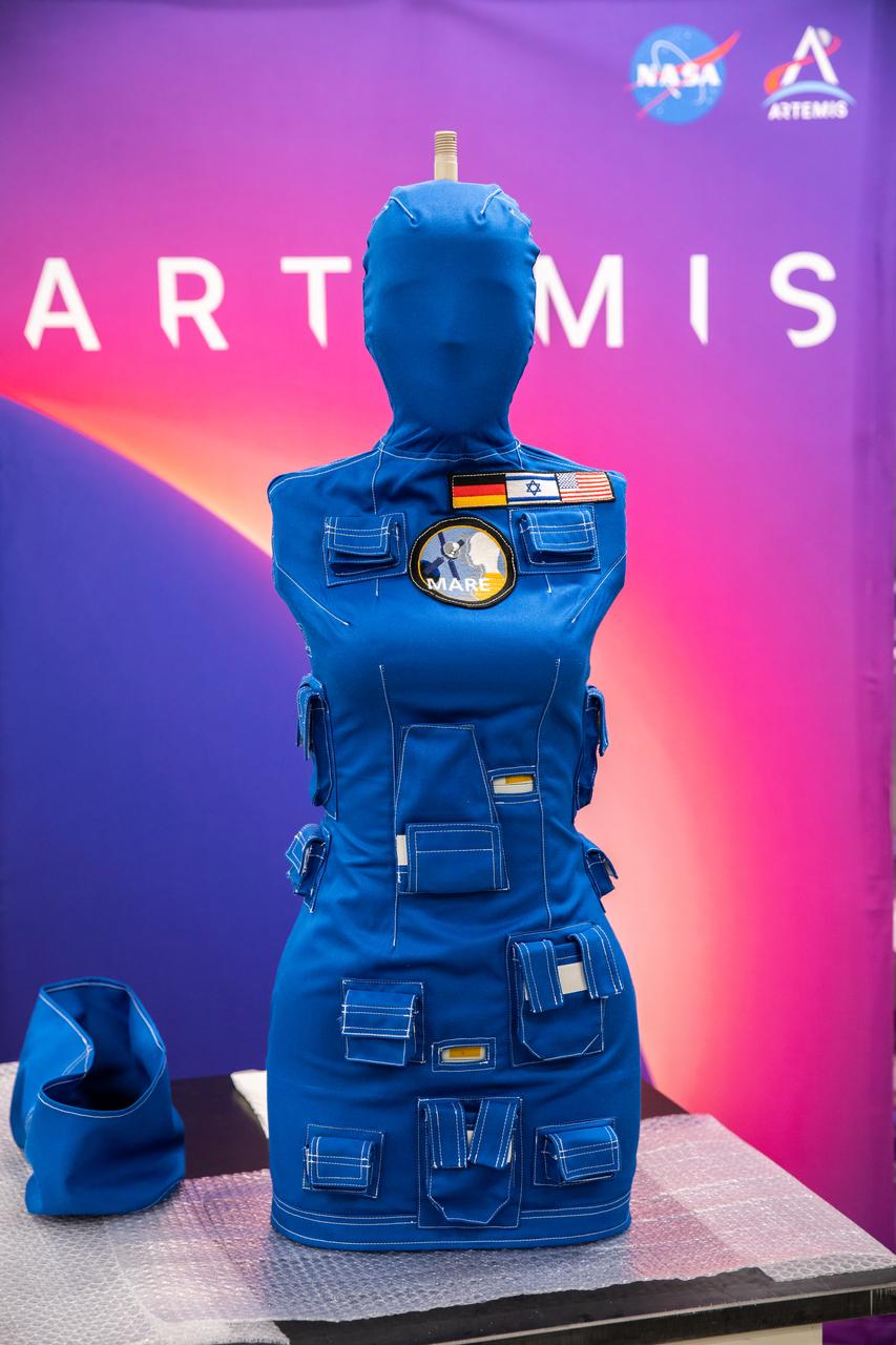 After a 25-day flight inside the Artemis I Orion crew module beyond the Moon and back, Helga, one of two identical phantom torsos, is shown without a radiation detection vest while undergoing post-flight payload inspections inside the Space Station Processing Facility at Kennedy Space Center in Florida on Jan. 11, 2023. The detectors will be removed at Kennedy and the torsos will return to teams at the German Space Agency for further analysis. As part of the Matroshka AstroRad Radiation Experiment (MARE) investigation, two female manikins – Helga and Zohar – were equipped with radiation detectors, while Zohar also wore a radiation protection vest, to determine the radiation risk during the Artemis I mission and potentially reduce exposure during future missions with astronauts. Artemis I Orion launched atop the Space Launch System (SLS) rocket from Kennedy’s Launch Complex 39B on Nov. 16, 2022, at 1:47 a.m. EST. During the flight, Orion flew farther than any spacecraft built for humans has ever flown, paving the way for human deep space exploration and demonstrating NASA’s commitment and capability to extend human presence to the Moon and beyond. The primary goal of Artemis I was to thoroughly test the SLS and Orion spacecraft’s integrated systems before crewed missions. Under Artemis, NASA aims to land the first woman and first person of color on the Moon and establish sustainable lunar exploration.