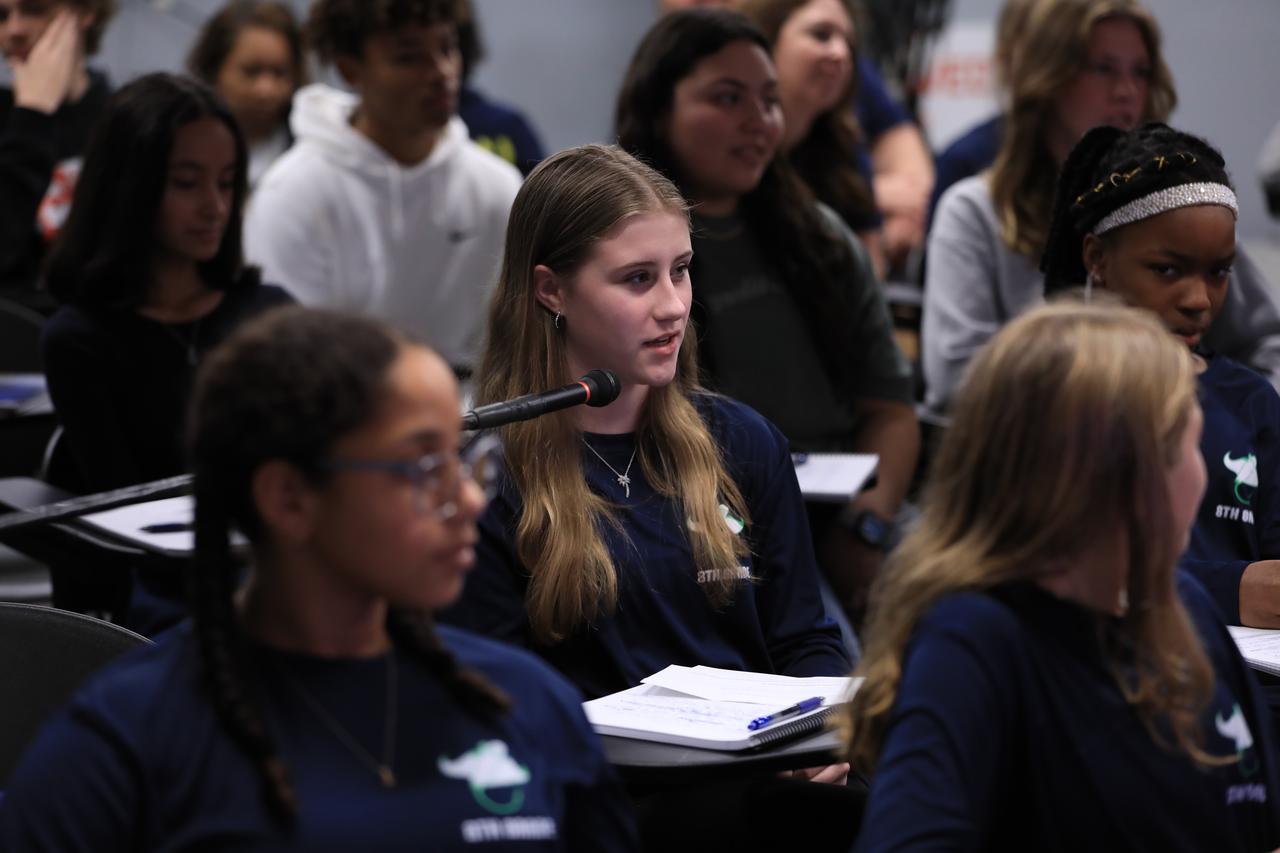 As part of NASA’s NextGen STEM project, students from Florida’s St. Cloud High School and Storm Grove Middle School in Vero Beach participate in an Artemis I student media briefing inside the John Holliman Auditorium of the News Center at NASA’s Kennedy Space Center in Florida on Jan. 19, 2023. Along with the students participating in person, middle and high school students across the country had the opportunity to ask questions of the panel via phone to discuss the Artemis I mission and the agency’s future of human space exploration.
