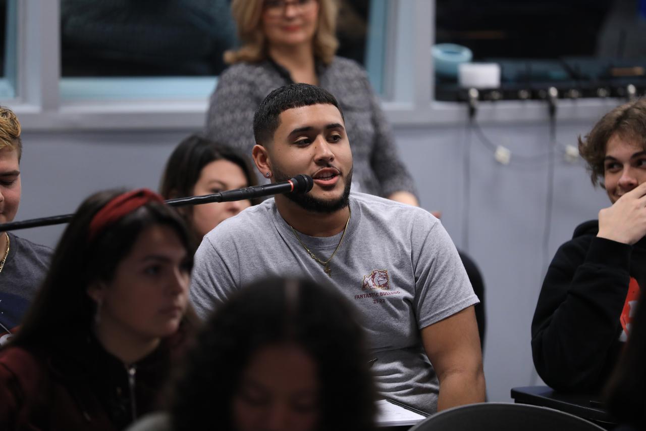 As part of NASA’s NextGen STEM project, students from Florida’s St. Cloud High School and Storm Grove Middle School in Vero Beach participate in an Artemis I student media briefing inside the John Holliman Auditorium of the News Center at NASA’s Kennedy Space Center in Florida on Jan. 19, 2023. Along with the students participating in person, middle and high school students across the country had the opportunity to ask questions of the panel via phone to discuss the Artemis I mission and the agency’s future of human space exploration.