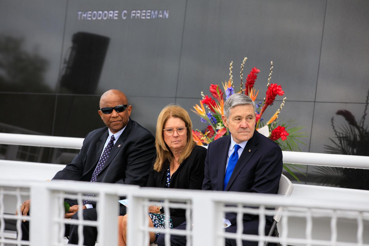 From left, Kennedy Space Center Deputy Director Kelvin Manning; Sheryl Chaffee, Astronauts Memorial Foundation (AMF) Board of Directors chairperson; and NASA Associate Administrator Bob Cabana, attend the Day of Remembrance ceremony at the Kennedy Space Center Visitor Complex in Florida on Jan. 26, 2023. The event honored the crews of Apollo 1 and space shuttles Challenger and Columbia, as well as other astronauts who lost their lives in the pursuit of spaceflight. This year marks the 20th anniversary of the Columbia tragedy. This year’s ceremony was hosted by the AMF, which was founded after the shuttle Challenger accident in 1986 to honor the sacrifices of fallen astronauts each year.