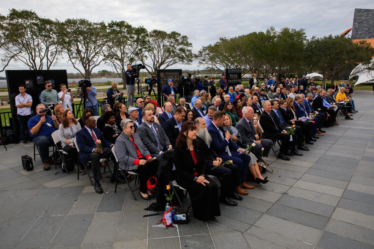 Kennedy Space Center workers and guests attend the Day of Remembrance at the Kennedy Space Center Visitor Complex in Florida on Jan. 26, 2023. The event honored the crews of Apollo 1 and space shuttles Challenger and Columbia, as well as other astronauts who lost their lives in the pursuit of spaceflight. This year marks the 20th anniversary of the Columbia tragedy. This year’s ceremony was hosted by the Astronauts Memorial Foundation, which was founded after the shuttle Challenger accident in 1986 to honor the sacrifices of fallen astronauts each year.