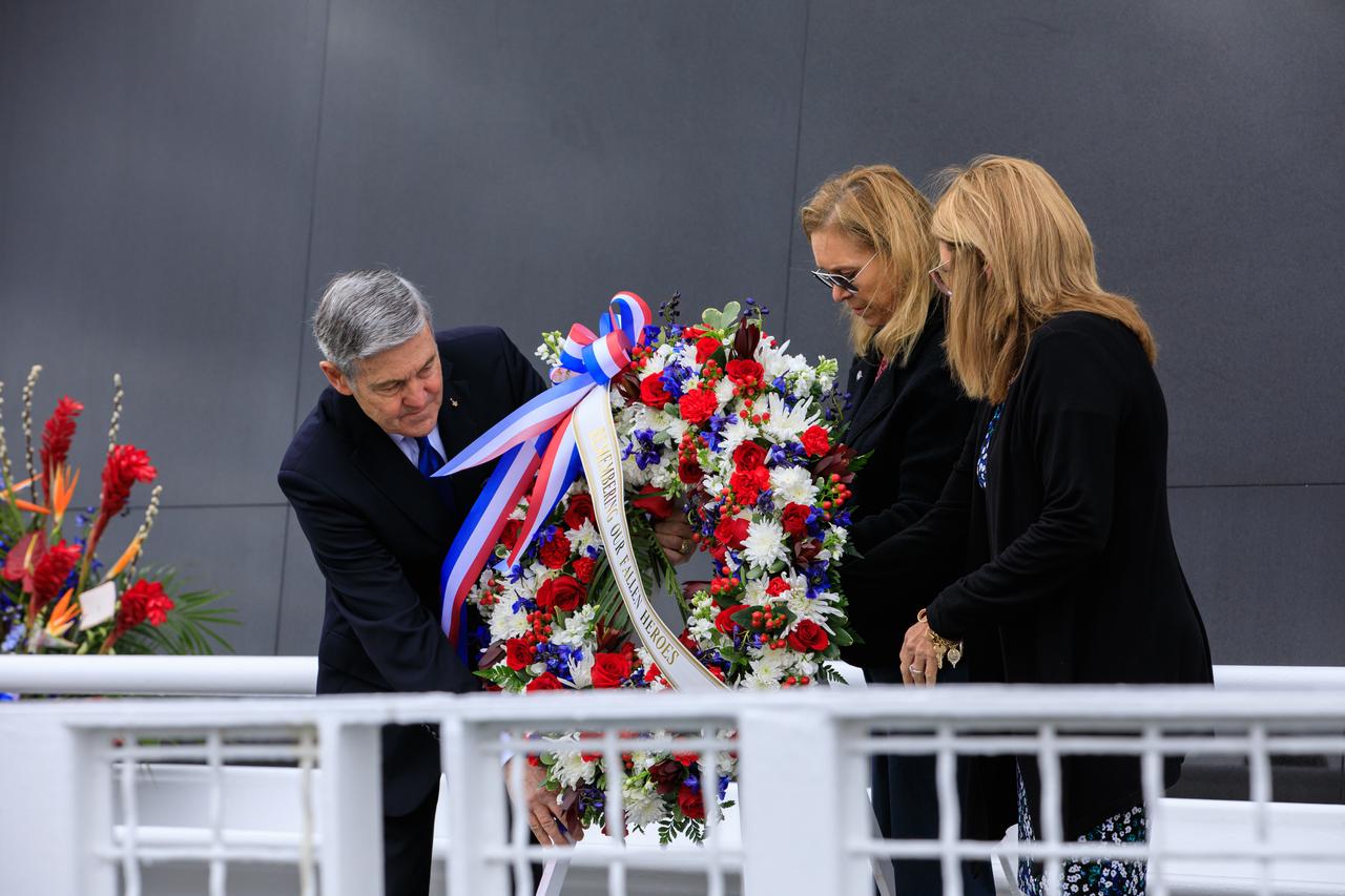 Sheryl Chafee, Astronauts Memorial Foundation (AMF) Board of Directors chairperson, at right, accompanied by NASA Associate Administrator Bob Cabana, and Kennedy Space Director Janet Petro, lay a wreath in front of the Space Mirror Memorial during the Day of Remembrance on Jan. 26, 2023, at the Kennedy Space Center Visitor Complex in Florida. The event honored the crews of Apollo 1 and space shuttles Challenger and Columbia, as well as other astronauts who lost their lives in the pursuit of spaceflight. This year marks the 20th anniversary of the Columbia tragedy. This year’s ceremony was hosted by the AMF, which was founded after the shuttle Challenger accident in 1986 to honor the sacrifices of fallen astronauts each year. 