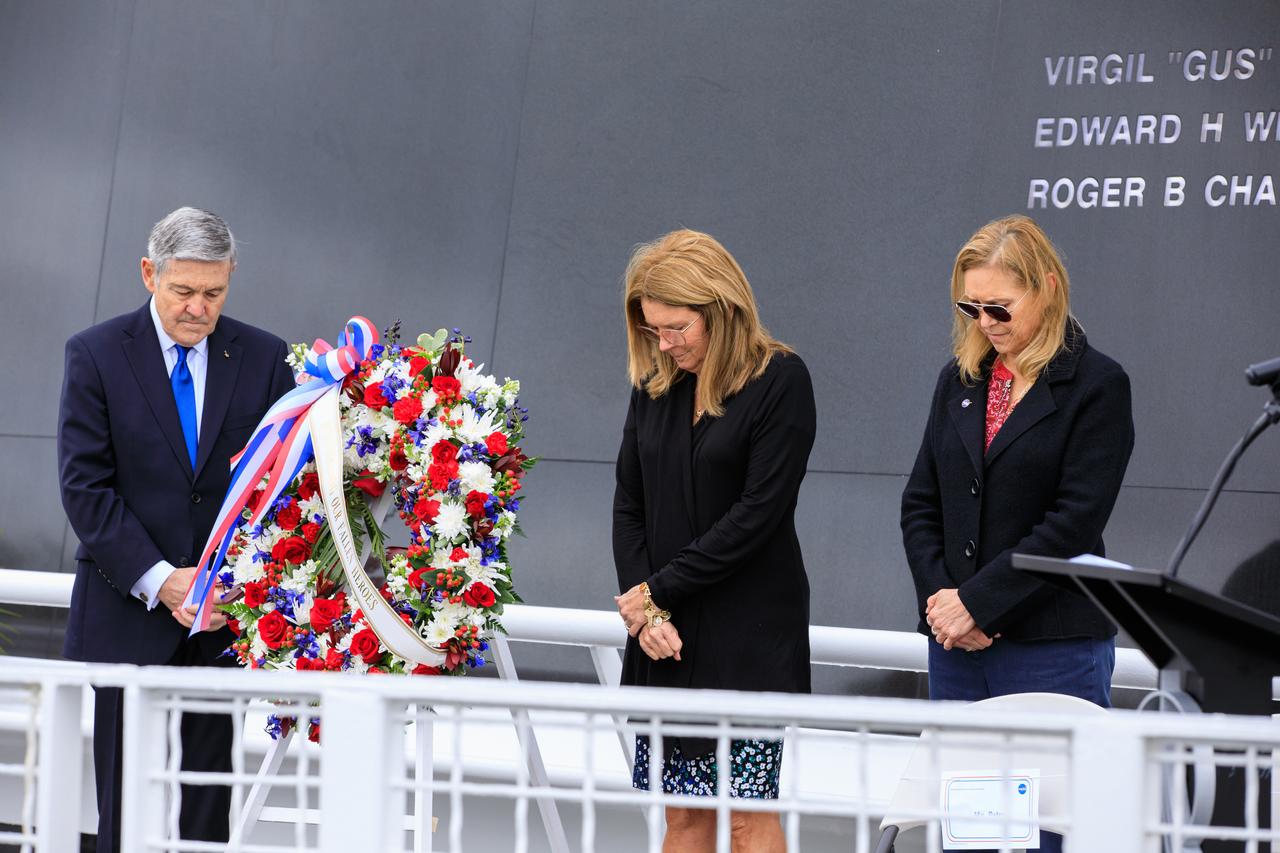 Sheryl Chafee, Astronauts Memorial Foundation (AMF) Board of Directors chairperson, center, accompanied by NASA Associate Administrator Bob Cabana, and Kennedy Space Director Janet Petro, lay a wreath in front of the Space Mirror Memorial during the Day of Remembrance on Jan. 26, 2023, at the Kennedy Space Center Visitor Complex in Florida. The event honored the crews of Apollo 1 and space shuttles Challenger and Columbia, as well as other astronauts who lost their lives in the pursuit of spaceflight. This year marks the 20th anniversary of the Columbia tragedy. This year’s ceremony was hosted by the AMF, which was founded after the shuttle Challenger accident in 1986 to honor the sacrifices of fallen astronauts each year. 
