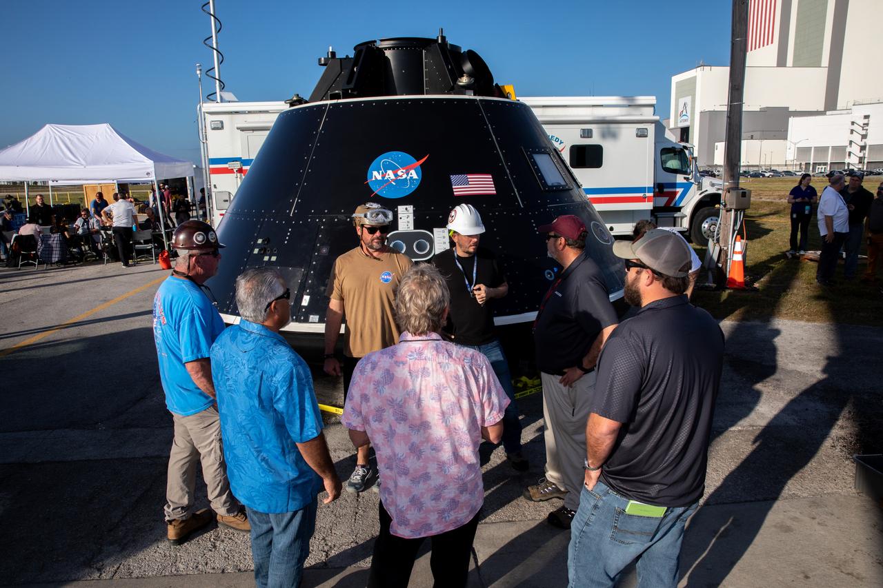 Landing and recovery team members review procedures before they begin using the Crew Module Test Article (CMTA) at the turn basin in the Launch Complex 39 area at NASA’s Kennedy Space Center in Florida on Jan. 30, 2023. The CMTA is being used to practice recovery after splashdown of the Orion spacecraft to prepare for the Artemis II crewed mission. Exploration Ground Systems leads recovery efforts. 
