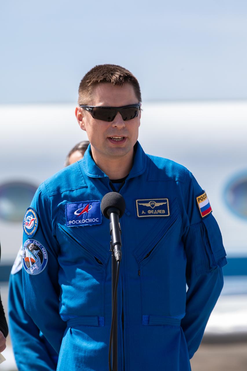 Roscosmos cosmonaut Andrey Fedyaev speaks to members of the news media during crew arrival for NASA’s SpaceX Crew-6 mission at Kennedy Space Center’s Launch and Landing Facility in Florida on Feb. 21, 2023. Fedyaev, along with NASA astronauts Stephen Bowen and Warren “Woody” Hoburg, and UAE (United Arab Emirates) astronaut Sultan Alneyadi will launch to the International Space Station aboard the Crew Dragon on a SpaceX Falcon 9. Launch is targeted for no earlier than Feb. 26 at 2:07 a.m. EST from Launch Complex 39A. Crew-6 is the sixth crew rotation mission with SpaceX to the station, and the seventh flight of Dragon with people as part of the agency’s Commercial Crew Program. 