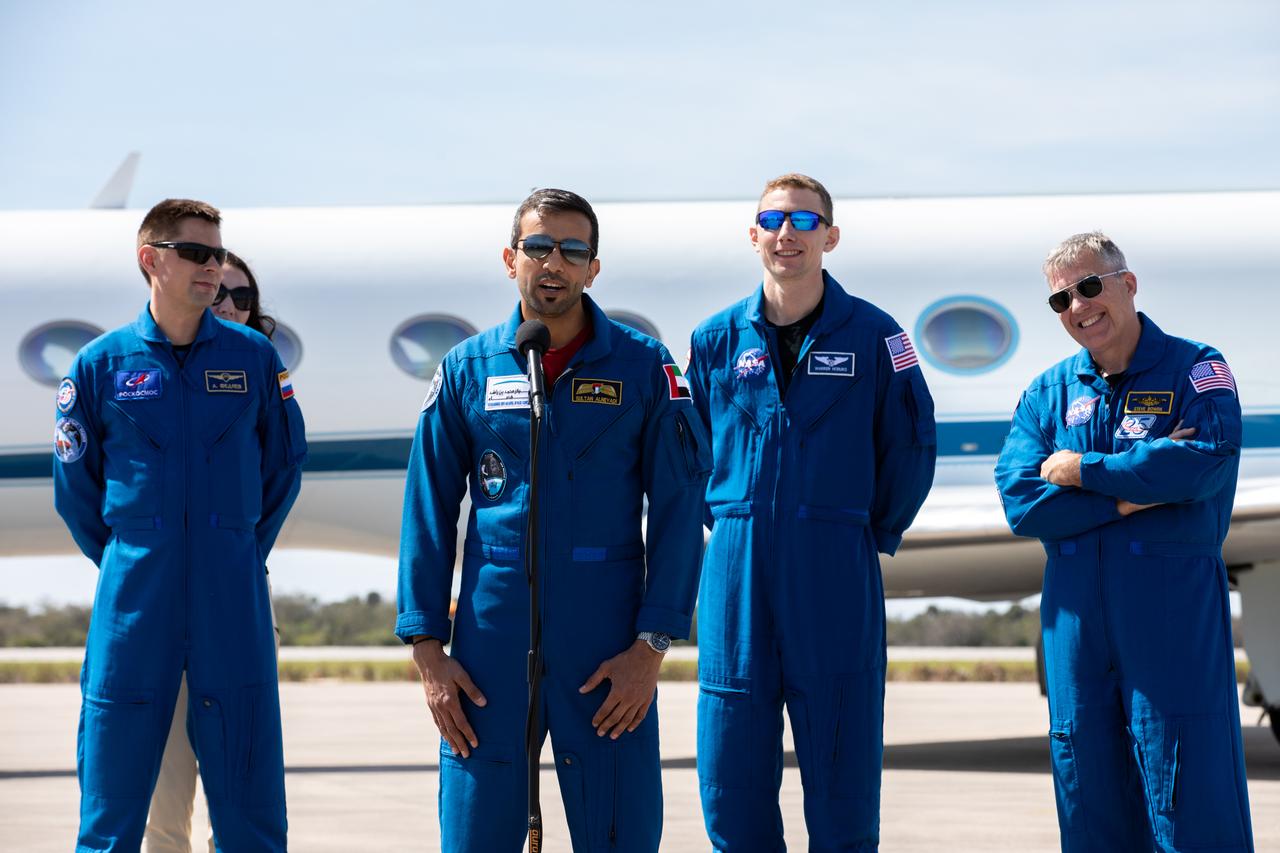UAE (United Arab Emirates) astronaut Sultan Alneyadi speaks to members of the news media during crew arrival for NASA’s SpaceX Crew-6 mission at Kennedy Space Center’s Launch and Landing Facility in Florida on Feb. 21, 2023. Behind him, from left, are Roscosmos cosmonaut Andrey Fedyaev Alneyadi and NASA astronauts Warren “Woody” Hoburg and Stephen Bowen. The crew will launch to the International Space Station aboard the Crew Dragon on a SpaceX Falcon 9 no earlier than Feb. 26 at 2:07 a.m. EST from Launch Complex 39A. Crew-6 is the sixth crew rotation mission with SpaceX to the station, and the seventh flight of Dragon with people as part of the agency’s Commercial Crew Program. 