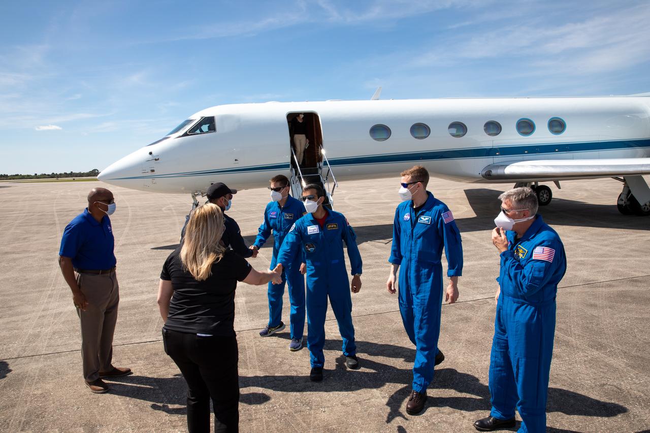 Kennedy Space Center Deputy Director Kelvin Manning, Dana Hutcherson, deputy manager, NASA’s Commercial Crew Program, and Salem AlMarri, director general, Mohammed Bin Rashid Space Centre, greet the crew members of NASA’s SpaceX Crew-6 mission after their arrival at the center’s Launch and Landing Facility in Florida on Feb. 21, 2023. From left are Manning, Hutcherson, AlMarri, Roscosmos cosmonaut Andrey Fedyaev, UAE (United Arab Emirates) astronaut Sultan Alneyadi, and NASA astronauts Warren “Woody” Hoburg and Stephen Bowen. Crew-6 will launch aboard the Crew Dragon on a SpaceX Falcon 9 rocket. Launch is targeted for no earlier than Feb. 26 at 2:07 a.m. EST. 