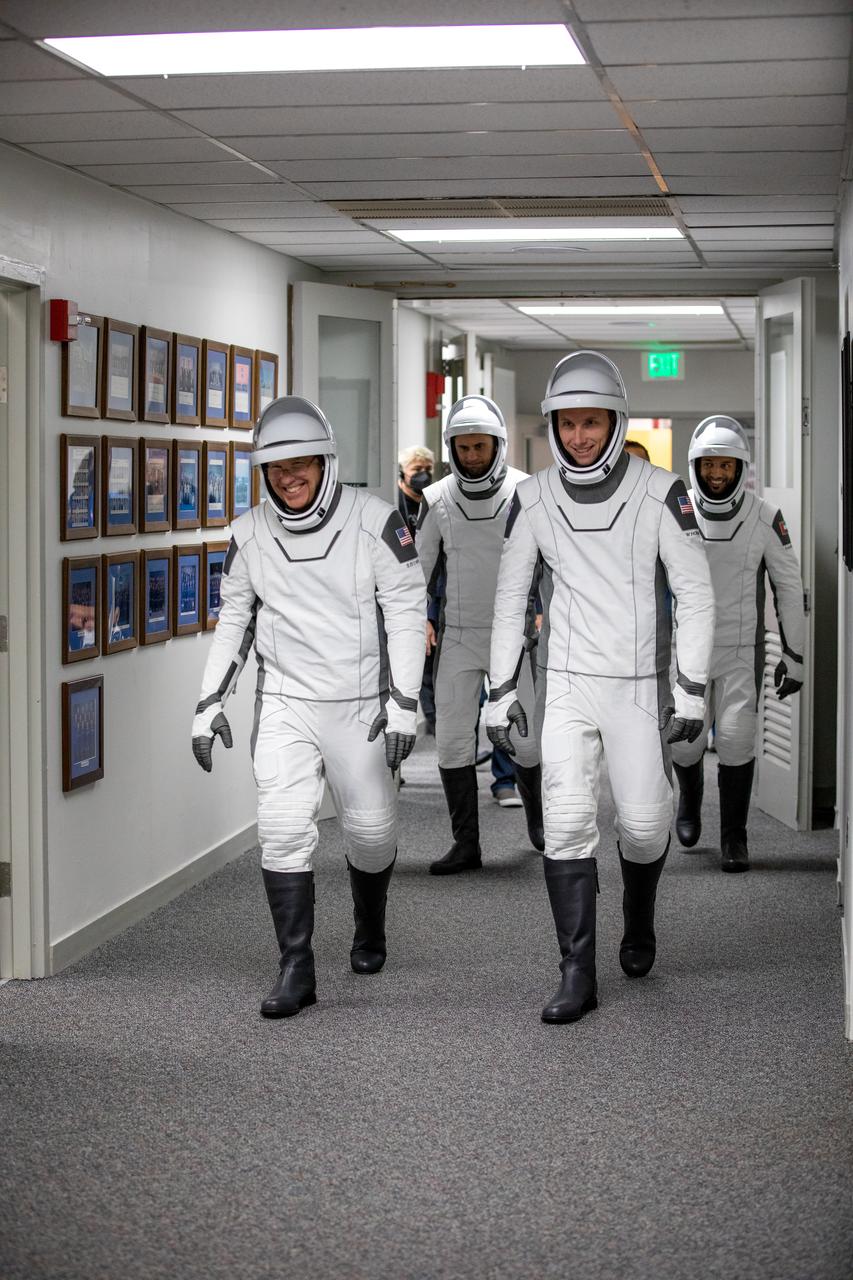 NASA’s SpaceX Crew-6 astronauts exit the crew suit-up room inside the Neil Armstrong Operations and Checkout Building and head for the elevator during a countdown dress rehearsal at the agency’s Kennedy Space Center in Florida on Feb. 23, 2023, to prepare for the upcoming Crew-6 launch. In front, from left are NASA astronaut Stephen Bowen, commander; and NASA astronaut Warren “Woody” Hoburg, pilot. Behind them, from left are Andrey Fedyaev, Roscosmos cosmonaut and mission specialist; and Sultan Alneyadi, UAE (United Arab Emirates) astronaut and mission specialist. The Crew-6 astronauts will launch to the International Space Station aboard the Crew Dragon Endeavour on a SpaceX Falcon 9. Launch is targeted for 1:45 a.m. EST on Feb. 27 from Launch Complex 39A. Crew-6 is the sixth crew rotation mission with SpaceX to the station, and the seventh flight of Dragon with people as part of the agency’s Commercial Crew Program.