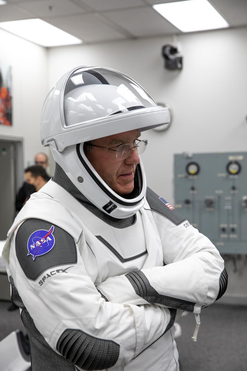 NASA astronaut and SpaceX Crew-6 commander Stephen Bowen is in his SpaceX spacesuit inside the crew suit-up room in the Neil Armstrong Operations and Checkout Building at NASA’s Kennedy Space Center in Florida during a countdown dress rehearsal on Feb. 23, 2023, to prepare for the upcoming Crew-6 launch. The Crew-6 astronauts will launch to the International Space Station aboard the Crew Dragon Endeavour on a SpaceX Falcon 9. Launch is targeted for 1:45 a.m. EST on Feb. 27 from Launch Complex 39A. Crew-6 is the sixth crew rotation mission with SpaceX to the station, and the seventh flight of Dragon with people as part of the agency’s Commercial Crew Program. 