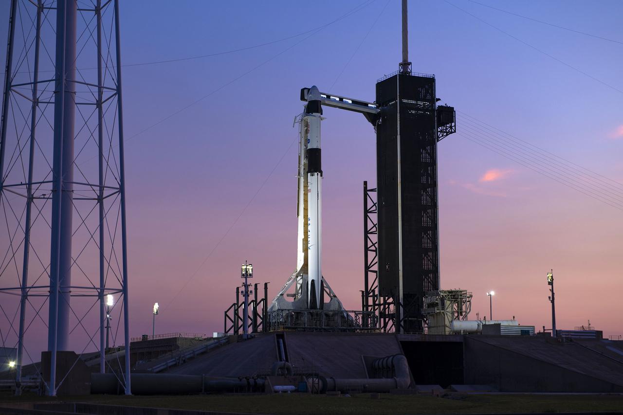 A colorful sunset serves as the backdrop for SpaceX’s Falcon 9 rocket and Dragon spacecraft Endeavour on the pad at Launch Complex 39A at Kennedy Space Center in Florida on Feb. 23, 2023, for NASA’s SpaceX Crew-6 mission. The crew access arm has been moved into position at the Dragon spacecraft. NASA astronauts Stephen Bowen, spacecraft commander, and Warren “Woody” Hoburg, pilot, along with mission specialists Sultan Alneyadi, UAE (United Arab Emirates) astronaut, and Andrey Fedyaev, Roscosmos cosmonaut, are slated to launch to the International Space Station at 1:45 a.m. EST on Feb. 27 from Launch Complex 39A. Crew-6 is the sixth crew rotation mission with SpaceX to the station, and the seventh flight of Dragon with people as part of the agency’s Commercial Crew Program. 