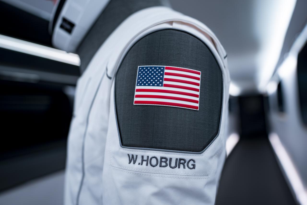 NASA SpaceX Crew-6 astronaut and pilot Warren “Woody” Hoburg, stands inside the crew access arm leading to the SpaceX Dragon spacecraft Endeavour during a countdown dress rehearsal at NASA’s Kennedy Space Center in Florida on Feb. 23, 2023. Hoburg, along with NASA astronaut Stephen Bowen, spacecraft commander; Sultan Alneyadi, UAE (United Arab Emirates) astronaut and mission specialist; and Andrei Fedyaev, Roscosmos cosmonaut and mission specialist will launch to the International Space Station aboard the Crew Dragon Endeavour on a SpaceX Falcon 9. Launch is targeted for 1:45 a.m. EST on Feb. 27 from Launch Complex 39A. Crew-6 is the sixth crew rotation mission with SpaceX to the station, and the seventh flight of Dragon with people as part of the agency’s Commercial Crew Program. 