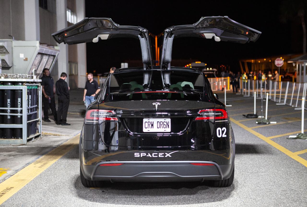 In view outside the Neil Armstrong Operations and Checkout Building at NASA’s Kennedy Space Center in Florida on Feb. 26, 2023, is one of two Tesla vehicles that will transport NASA’s SpaceX Crew-6 astronauts to Launch Complex 39A for launch to the International Space Station. Crew-6 astronauts are NASA astronaut Stephen Bowen, spacecraft commander; NASA astronaut Warren “Woody” Hoburg, pilot; Sultan Alneyadi, UAE (United Arab Emirates) astronaut and mission specialist; and Andrei Fedyaev, Roscosmos cosmonaut and mission specialist. Launch was targeted for 1:45 a.m. EST on Feb. 27 from Launch Complex 39A, but was scrubbed for the day. Crew-6 is the sixth crew rotation mission with SpaceX to the station, and the seventh flight of Dragon with people as part of the agency’s Commercial Crew Program. 