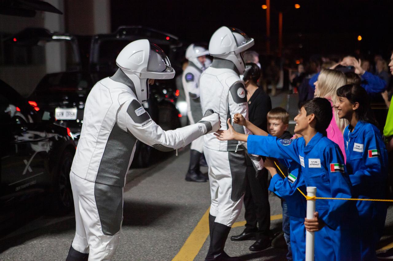 NASA’s SpaceX Crew-6 astronauts greet their family members after walking out of the Neil Armstrong Operations and Checkout Building at the agency’s Kennedy Space Center in Florida on Feb. 26, 2023. Crew-6 astronauts are NASA astronaut Stephen Bowen, spacecraft commander; NASA astronaut Warren “Woody” Hoburg, pilot; Sultan Alneyadi, UAE (United Arab Emirates) astronaut and mission specialist; and Andrey Fedyaev, Roscosmos cosmonaut and mission specialist. They will board two Tesla vehicles for the trip to Kennedy’s Launch Complex 39A, where they will launch to the International Space Station aboard SpaceX’s Dragon Endeavour spacecraft. Launch was targeted for 1:45 a.m. EST on Feb. 27 from Launch Complex 39A, but was scrubbed for the day. Crew-6 is the sixth crew rotation mission with SpaceX to the station, and the seventh flight of Dragon with people as part of the agency’s Commercial Crew Program. 