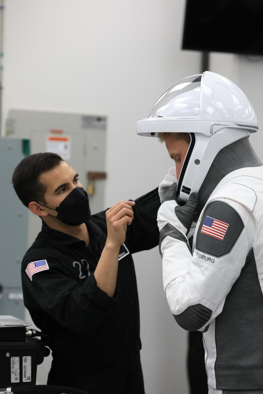 NASA’s SpaceX Crew-6 crewmember Warren “Woody” Hoburg, pilot, checks his SpaceX spacesuit in the crew suit-up room inside the Neil Armstrong Operations and Checkout Building at NASA’s Kennedy Space Center in Florida on Feb. 26, 2023. He and his crewmates are preparing for their launch to the International Space Station aboard SpaceX’s Dragon spacecraft atop the Falcon 9 rocket. Launch was targeted for 1:45 a.m. EST on Feb. 27 from Launch Complex 39A, but was scrubbed for the day. Crew-6 is the sixth crew rotation mission with SpaceX to the station, and the seventh flight of Dragon with people as part of the agency’s Commercial Crew Program.