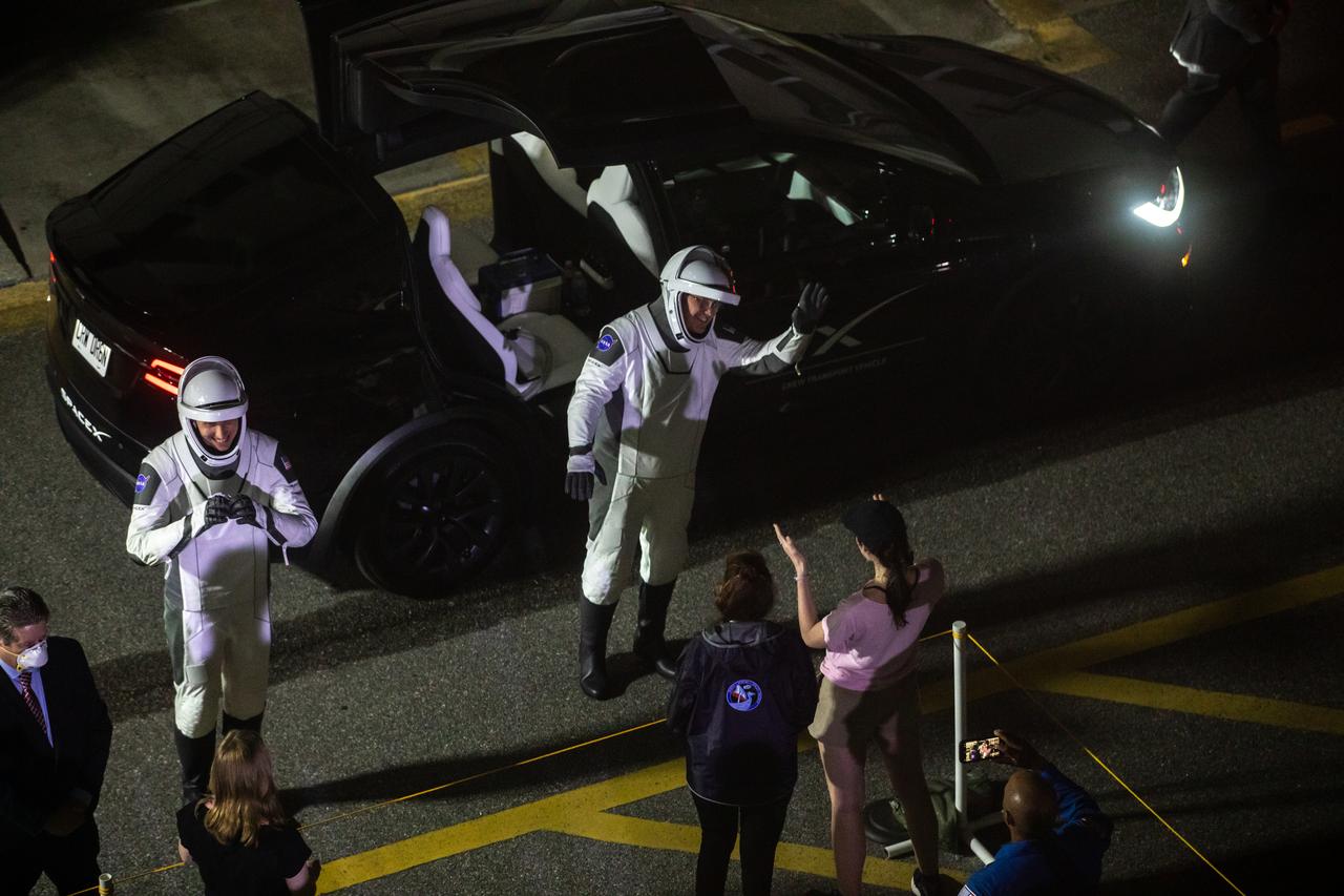 NASA’s SpaceX Crew-6 astronauts greet their family members after walking out of the Neil Armstrong Operations and Checkout Building at the agency’s Kennedy Space Center in Florida on Feb. 26, 2023. From left are NASA astronaut Warren “Woody” Hoburg, pilot; and NASA astronaut Stephen Bowen, spacecraft commander. They will board one of the Tesla vehicles for the trip to Kennedy’s Launch Complex 39A, where they will launch to the International Space Station aboard SpaceX’s Dragon Endeavour spacecraft. Launch was targeted for 1:45 a.m. EST on Feb. 27 from Launch Complex 39A, but was scrubbed for the day. Crew-6 is the sixth crew rotation mission with SpaceX to the station, and the seventh flight of Dragon with people as part of the agency’s Commercial Crew Program.