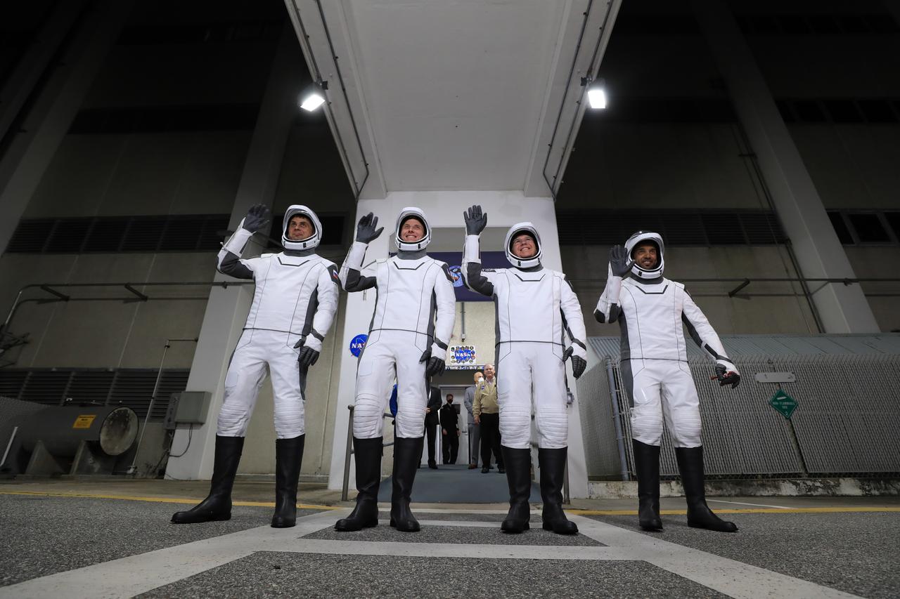 NASA’s SpaceX Crew-6 astronauts wave after walking out of the Neil Armstrong Operations and Checkout Building at the agency’s Kennedy Space Center in Florida on Feb. 26, 2023. From left are Andrey Fedyaev, Roscosmos cosmonaut and mission specialist; NASA astronaut Warren “Woody” Hoburg, pilot; NASA astronaut Stephen Bowen, spacecraft commander; and Sultan Alneyadi, UAE (United Arab Emirates) astronaut and mission specialist. They will board two Tesla vehicles for the trip to Kennedy’s Launch Complex 39A, where they will launch to the International Space Station aboard SpaceX’s Dragon Endeavour spacecraft. Launch was targeted for 1:45 a.m. EST on Feb. 27 from Launch Complex 39A, but was scrubbed for the day. Crew-6 is the sixth crew rotation mission with SpaceX to the station, and the seventh flight of Dragon with people as part of the agency’s Commercial Crew Program.