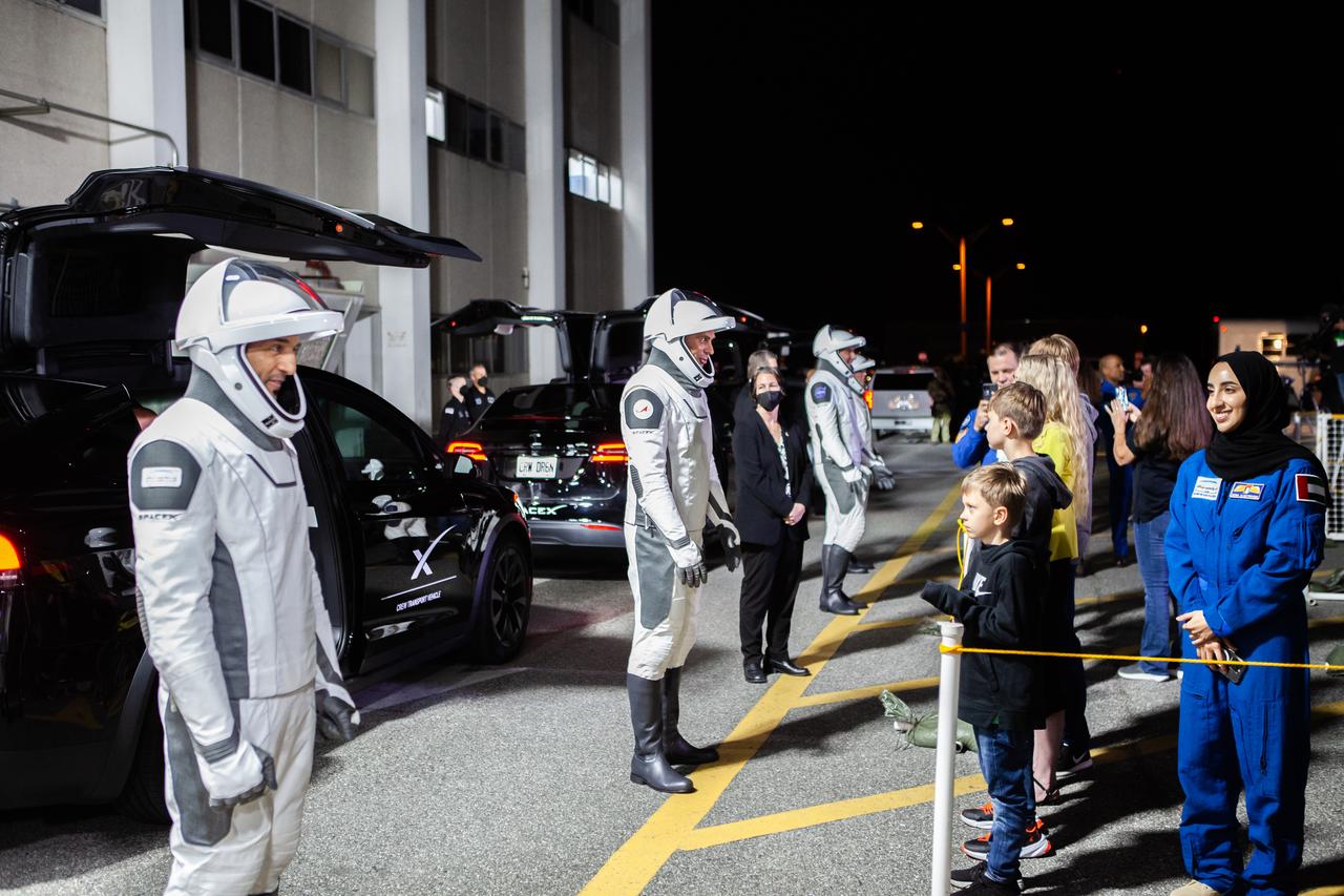 NASA’s SpaceX Crew-6 astronauts greet their family members after walking out of the Neil Armstrong Operations and Checkout Building at the agency’s Kennedy Space Center in Florida on March 1, 2023. From left are Sultan Alneyadi, UAE (United Arab Emirates) astronaut and mission specialist; Andrey Fedyaev, Roscosmos cosmonaut and mission specialist; NASA astronaut Warren Hoburg, pilot; and NASA astronaut Stephen Bowen, spacecraft commander. The crewmembers will board one of the Tesla vehicles for the trip to Kennedy’s Launch Complex 39A, where they will launch to the International Space Station aboard SpaceX’s Dragon Endeavour spacecraft atop the Falcon 9 rocket. Launch is targeted for 12:34 a.m. EST on March 2 from Launch Complex 39A. Crew-6 is the sixth crew rotation mission with SpaceX to the station, and the seventh flight of Dragon with people as part of the agency’s Commercial Crew Program.