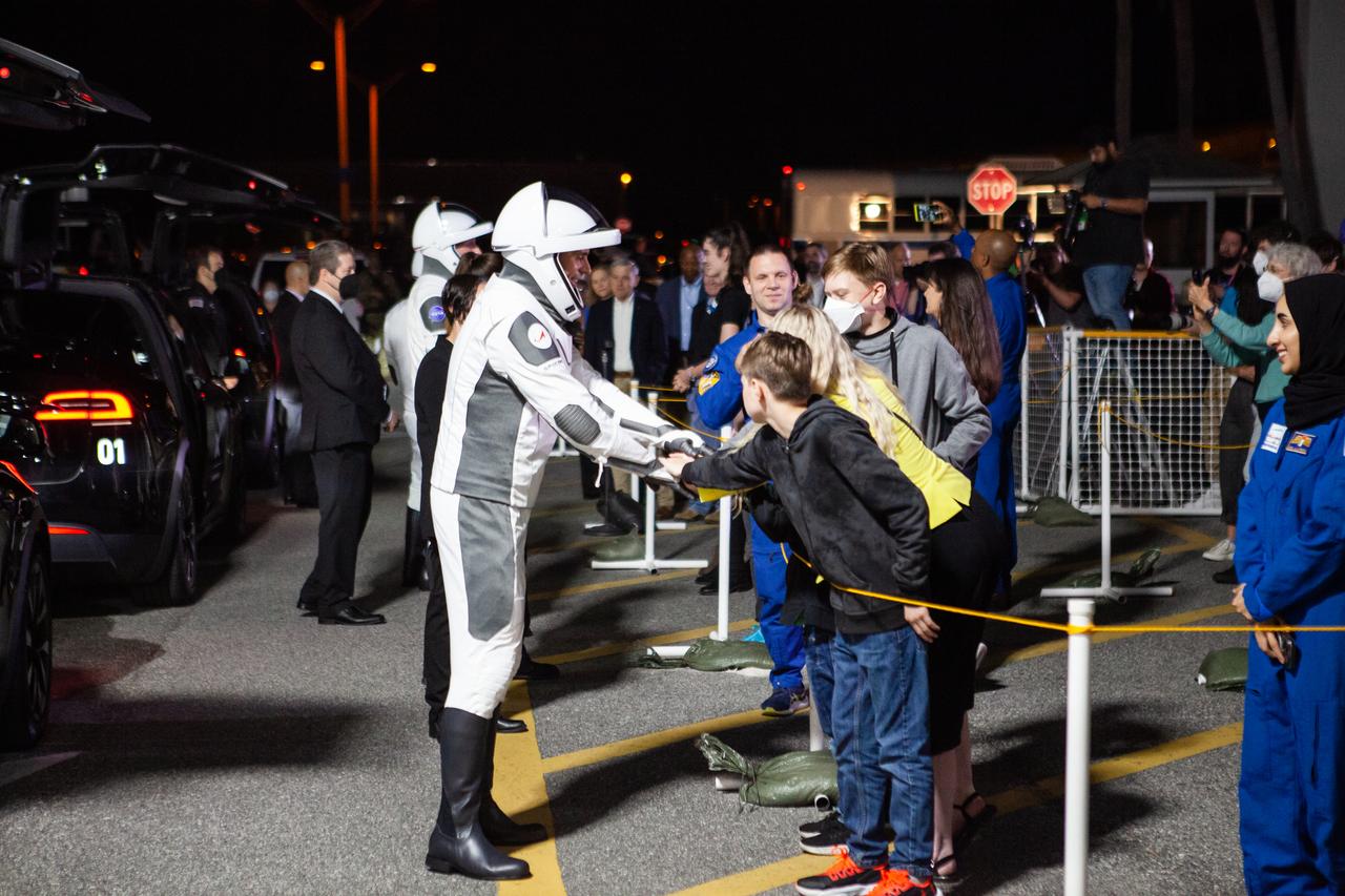 NASA’s SpaceX Crew-6 astronauts greet their family members after walking out of the Neil Armstrong Operations and Checkout Building at the agency’s Kennedy Space Center in Florida on March 1, 2023. In view at left is Sultan Alneyadi, UAE (United Arab Emirates) astronaut and mission specialist. The crewmembers will board one of the Tesla vehicles for the trip to Kennedy’s Launch Complex 39A, where they will launch to the International Space Station aboard SpaceX’s Dragon Endeavour spacecraft atop the Falcon 9 rocket. Launch is targeted for 12:34 a.m. EST on March 2 from Launch Complex 39A. Crew-6 is the sixth crew rotation mission with SpaceX to the station, and the seventh flight of Dragon with people as part of the agency’s Commercial Crew Program.