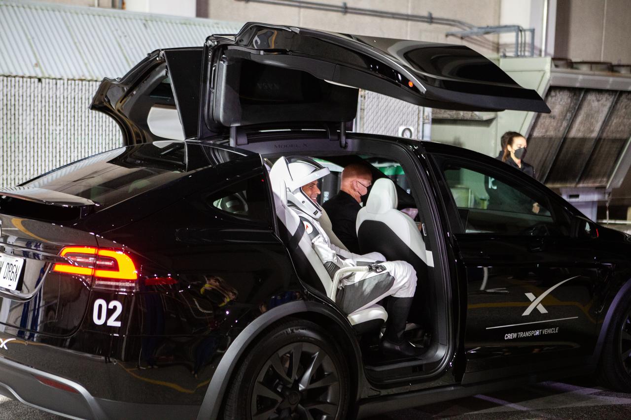 In view outside the Neil Armstrong Operations and Checkout Building at NASA’s Kennedy Space Center in Florida on March 1, 2023, SpaceX Crew-6 astronauts board the first of two Tesla vehicles that will transport NASA’s them to Launch Complex 39A for launch to the International Space Station. Launch of the Dragon spacecraft Endeavour atop the Falcon 9 rocket is targeted for 12:34 a.m. EST on March 2 from Launch Complex 39A. Crew-6 is the sixth crew rotation mission with SpaceX to the station, and the seventh flight of Dragon with people as part of the agency’s Commercial Crew Program. 