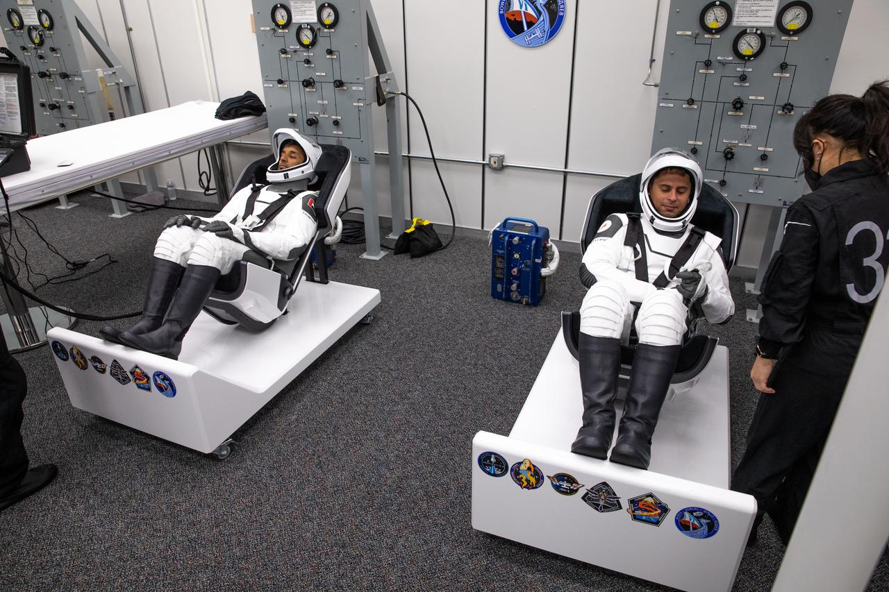 NASA’s SpaceX Crew-6 crewmembers participate in final fit checks of their SpaceX spacesuits in the crew suit-up room inside the Neil Armstrong Operations and Checkout Building at NASA’s Kennedy Space Center in Florida on March 1, 2023. From left are Andrey Fedyaev, Roscosmos cosmonaut and mission specialist; and Sultan Alneyadi, UAE (United Arab Emirates) astronaut and mission specialist. They and their  crewmates are preparing for launch to the International Space Station aboard SpaceX’s Dragon spacecraft Endeavour atop the Falcon 9 rocket. Launch is target for 12:34 a.m. EST on March 2 from Launch Complex 39A. Crew-6 is the sixth crew rotation mission with SpaceX to the station, and the seventh flight of Dragon with people as part of the agency’s Commercial Crew Program. 