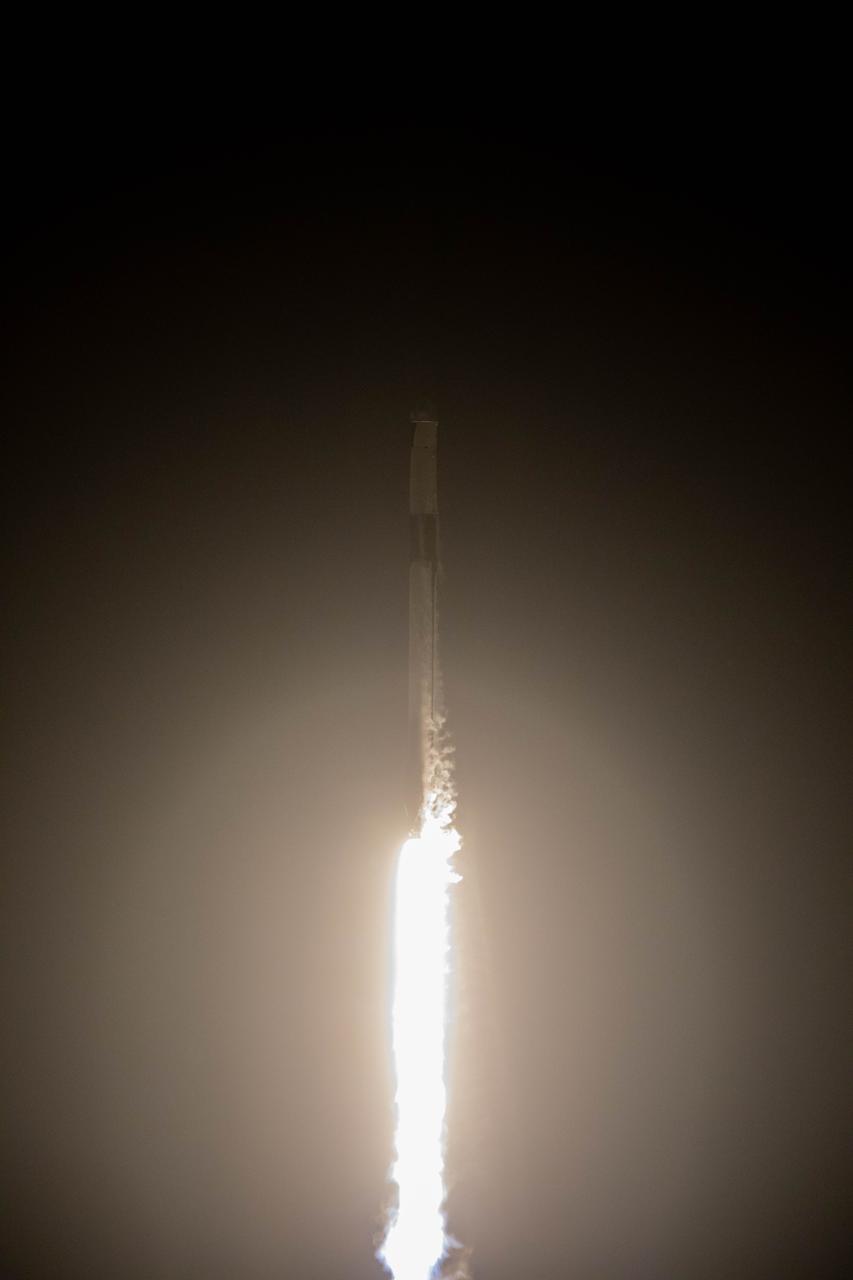 A SpaceX Falcon 9 rocket soars upward after its liftoff from Launch Complex 39A at NASA’s Kennedy Space Center in Florida on March 14, 2023, on the company’s 27th Commercial Resupply Services mission for the agency to the International Space Station. Liftoff was at 8:30 p.m. EDT. The Dragon spacecraft will deliver more than 6,000 pounds of science and research, supplies, and equipment to the crew aboard the space station, including the final two experiments comprising the National Institutes for Health and International Space Station National Laboratory’s Tissue Chips in Space initiative, Cardinal Heart 2.0 and Engineered Heart Tissues-2. The spacecraft is expected to spend about a month attached to the orbiting outpost before it returns to Earth with research and return cargo, splashing down off the coast of Florida.