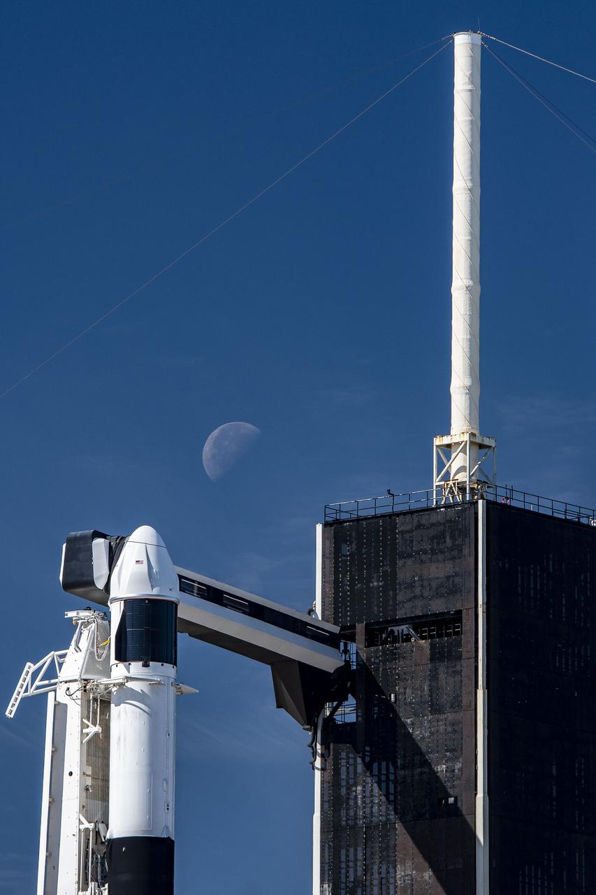 Seen here is a up-close view of the SpaceX Dragon spacecraft atop the company’s Falcon 9 rocket in the vertical position at NASA’s Kennedy Space Center in Florida on March 14, 2023, in preparation for the 27th commercial resupply services launch to the International Space Station. The mission will deliver new science investigations, supplies, and equipment to the crew aboard the space station, including the final two experiments comprising the National Institutes for Health and International Space Station National Laboratory’s Tissue Chips in Space initiative, Cardinal Heart 2.0 and Engineered Heart Tissues-2. Liftoff is scheduled for 8:30 p.m. EDT on Tuesday, March 14, from Kennedy’s Launch Complex 39A. 